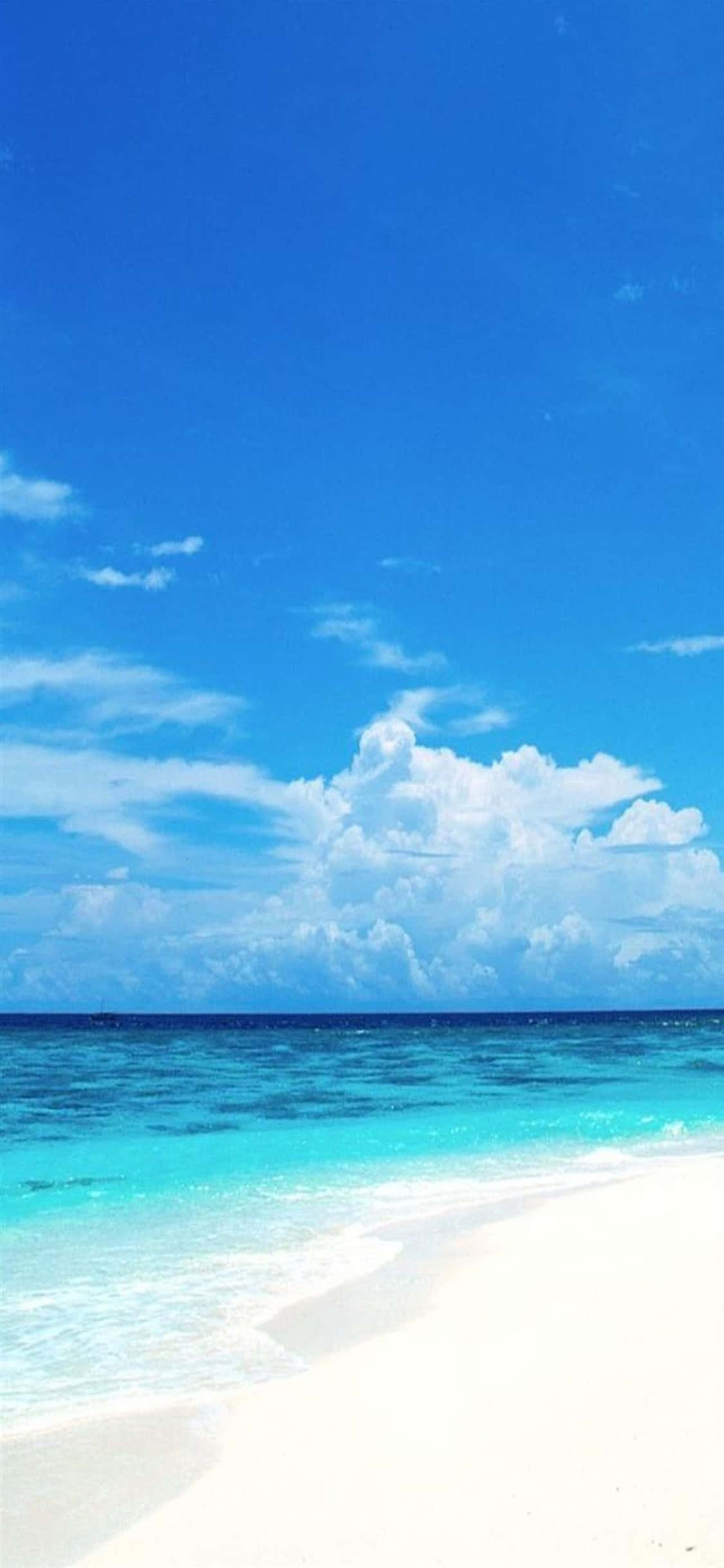 Fondo iPhone XS de Playa con Aguas Poco Profundas Fondos de pantalla