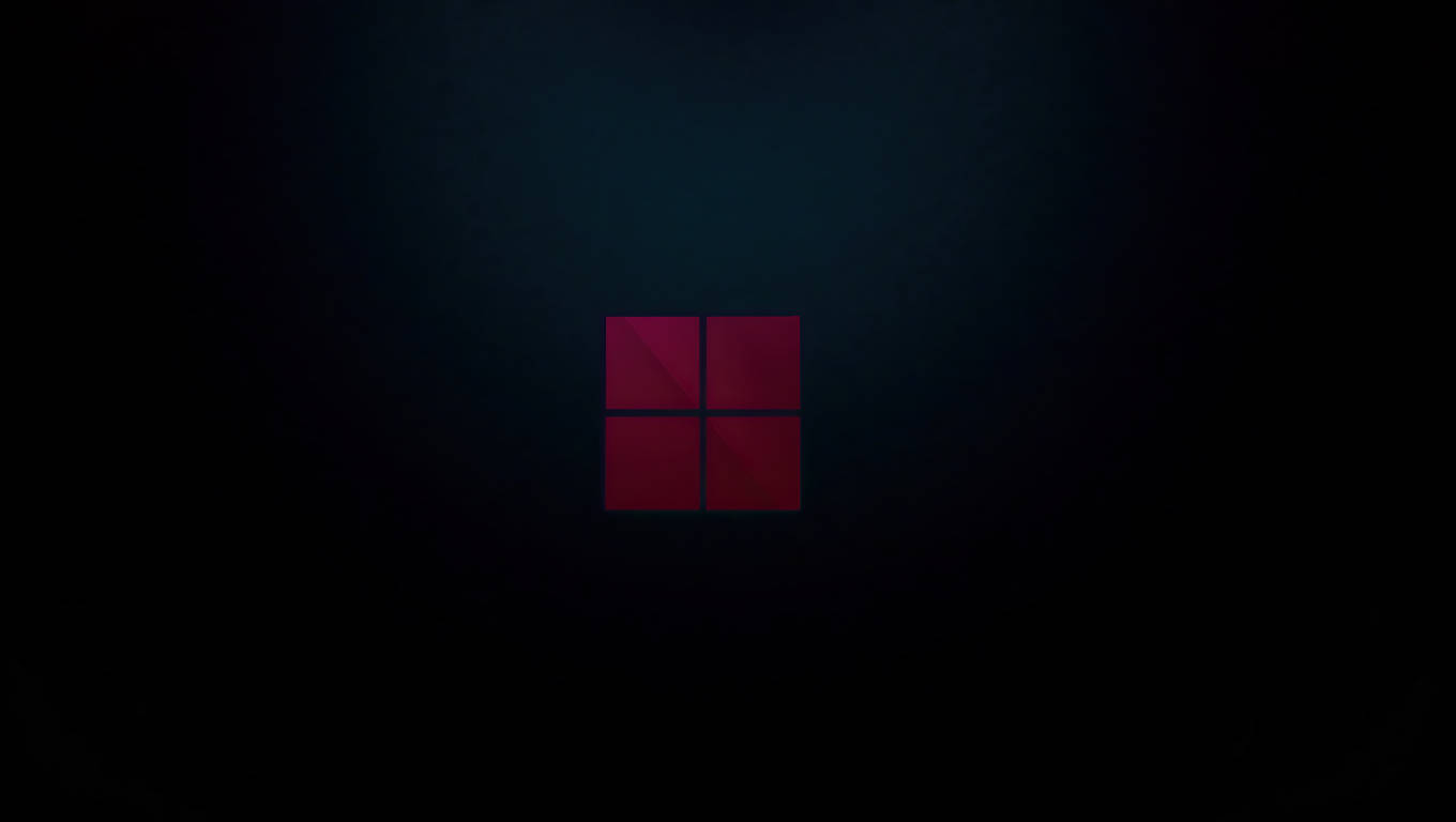 Fondo oscuro de laptop con logotipo de Windows 11 Fondos de pantalla