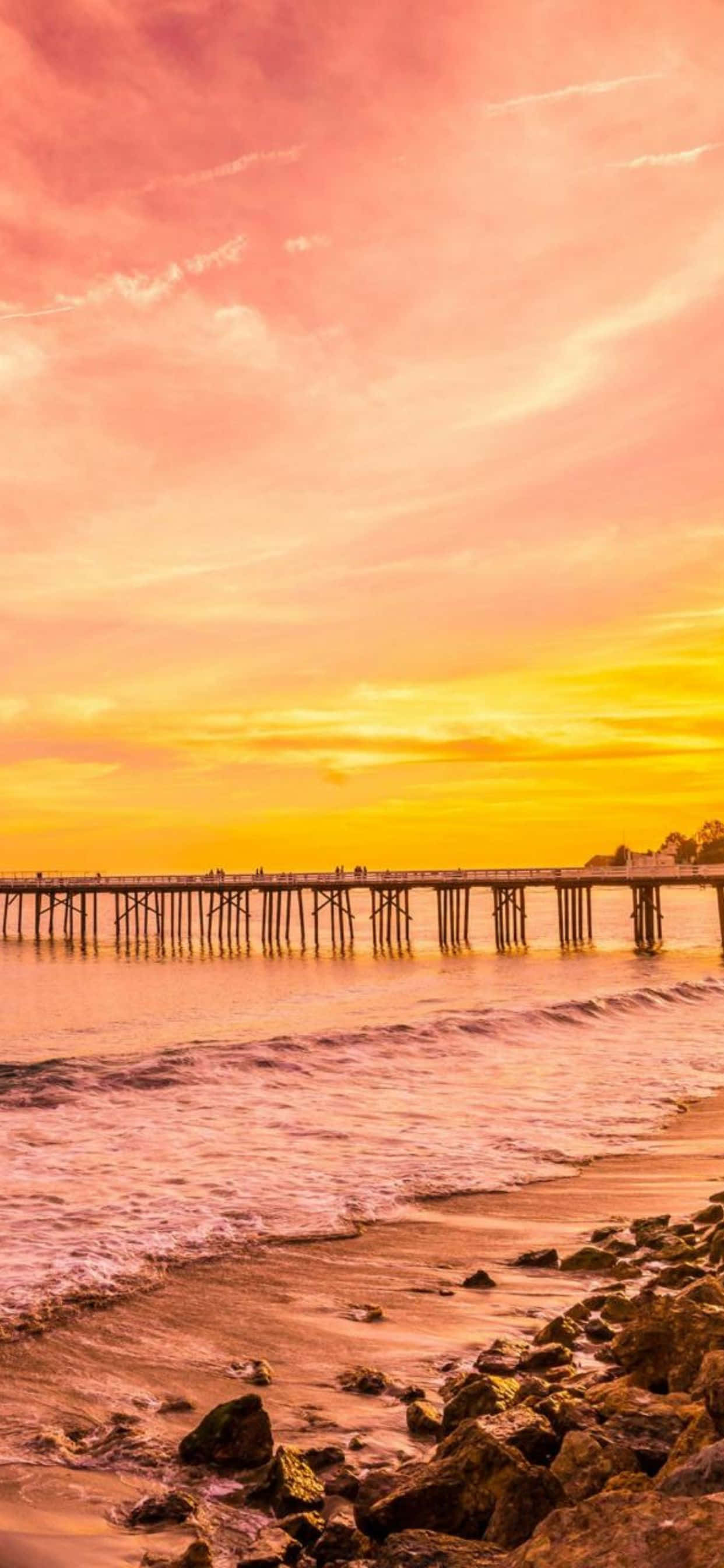 Fondo para iPhone Xs Max de Malibú con olas y cielo naranja Fondos de pantalla