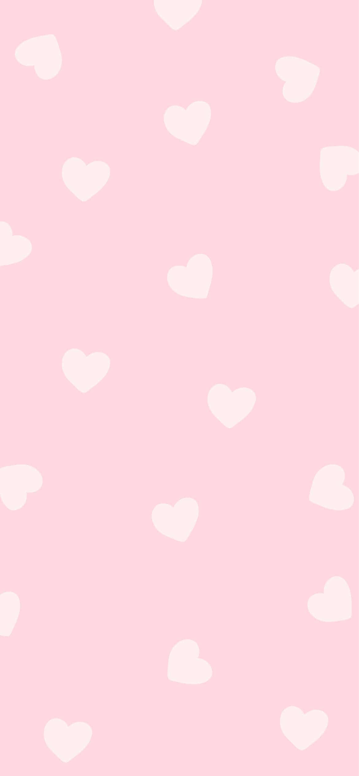 fondo rosa con corazones blancos Fondos de pantalla