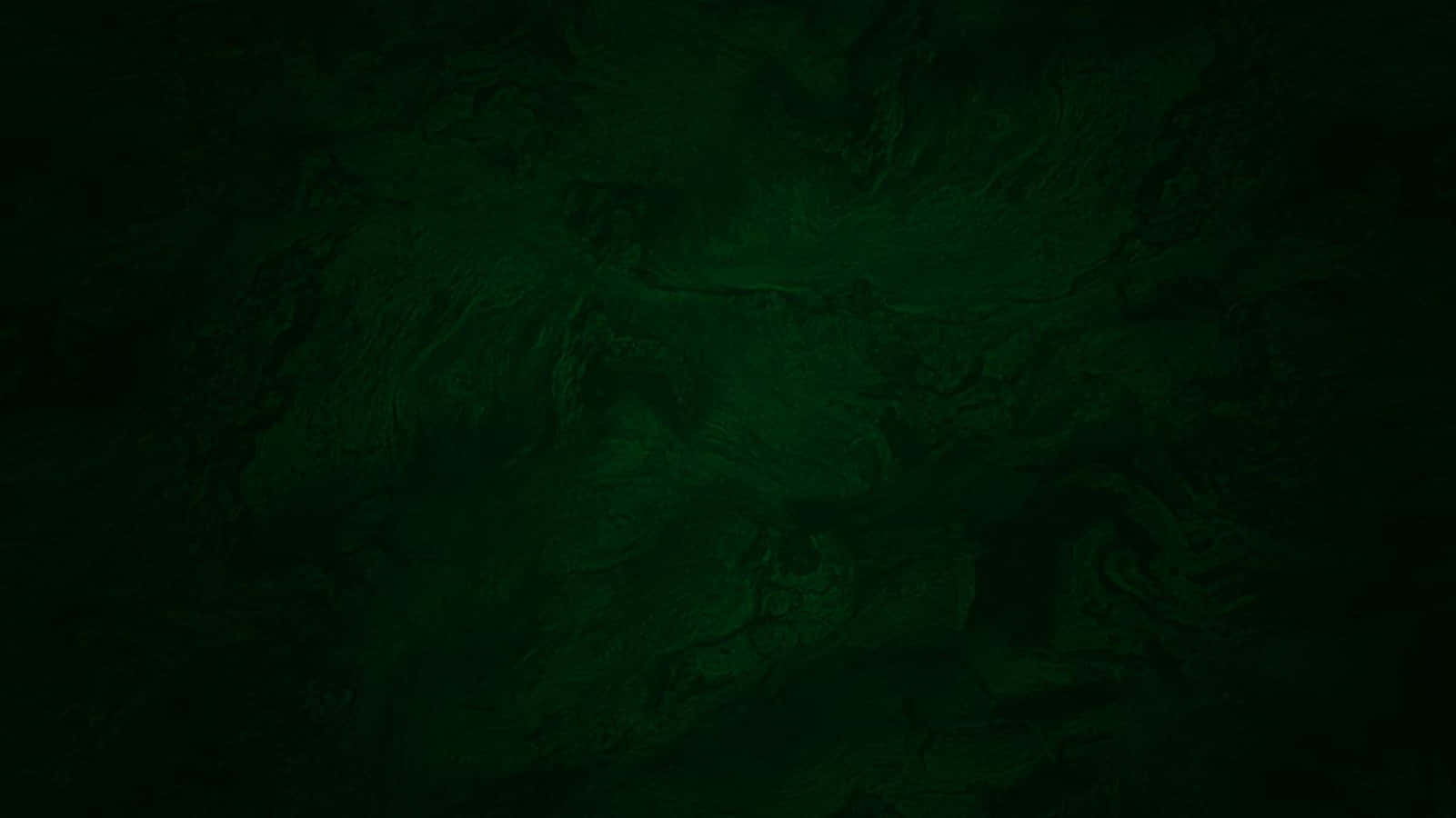 Fondo verde oscuro liso que bordea el negro Fondos de pantalla