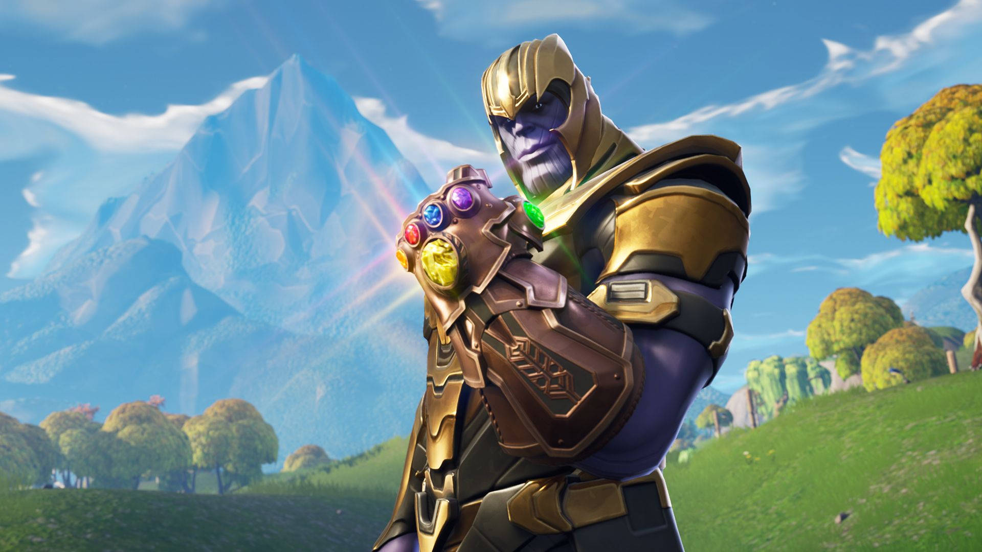 Fondo de pantalla HD de Thanus en Fortnite sosteniendo el guantelete del infinito.