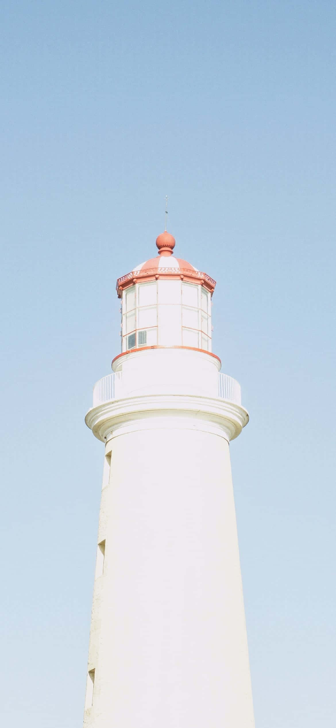 Fotografía Estética de Faro con Cielo Azul Bebé y Azul Claro Fondos de pantalla