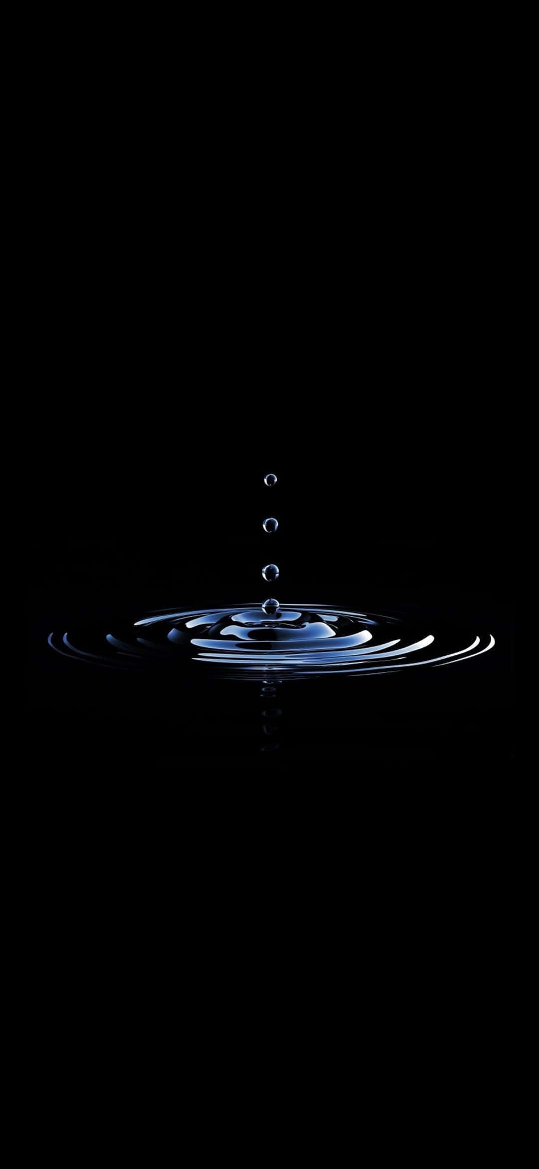 gota de agua sobre fondo negro Fondos de pantalla