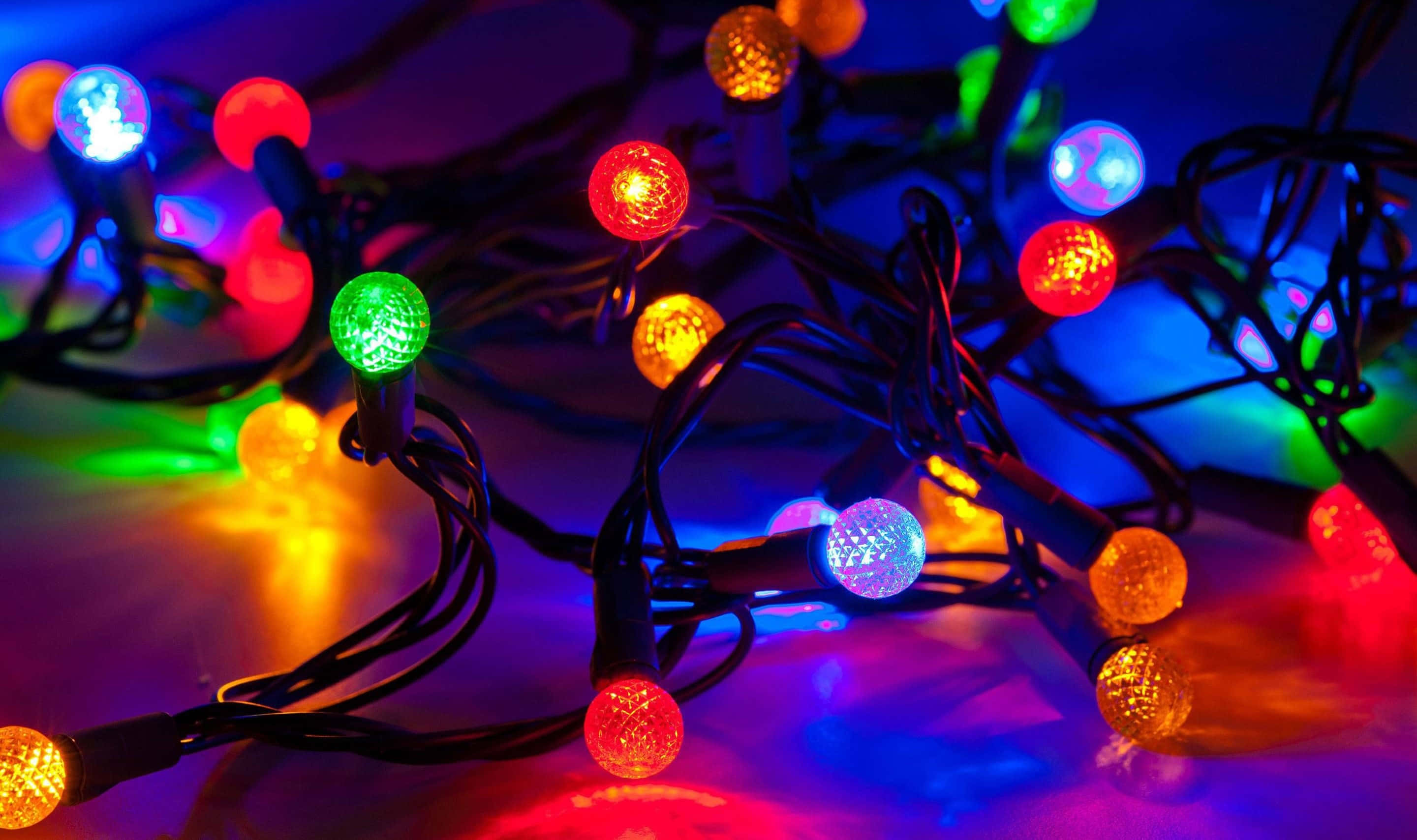 Ilumina la Noche Navideña con Luces de Navidad Fondos de pantalla