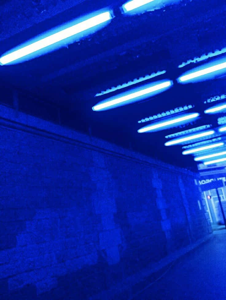 Ilumina tu día con un estético azul neón colorido Fondos de pantalla