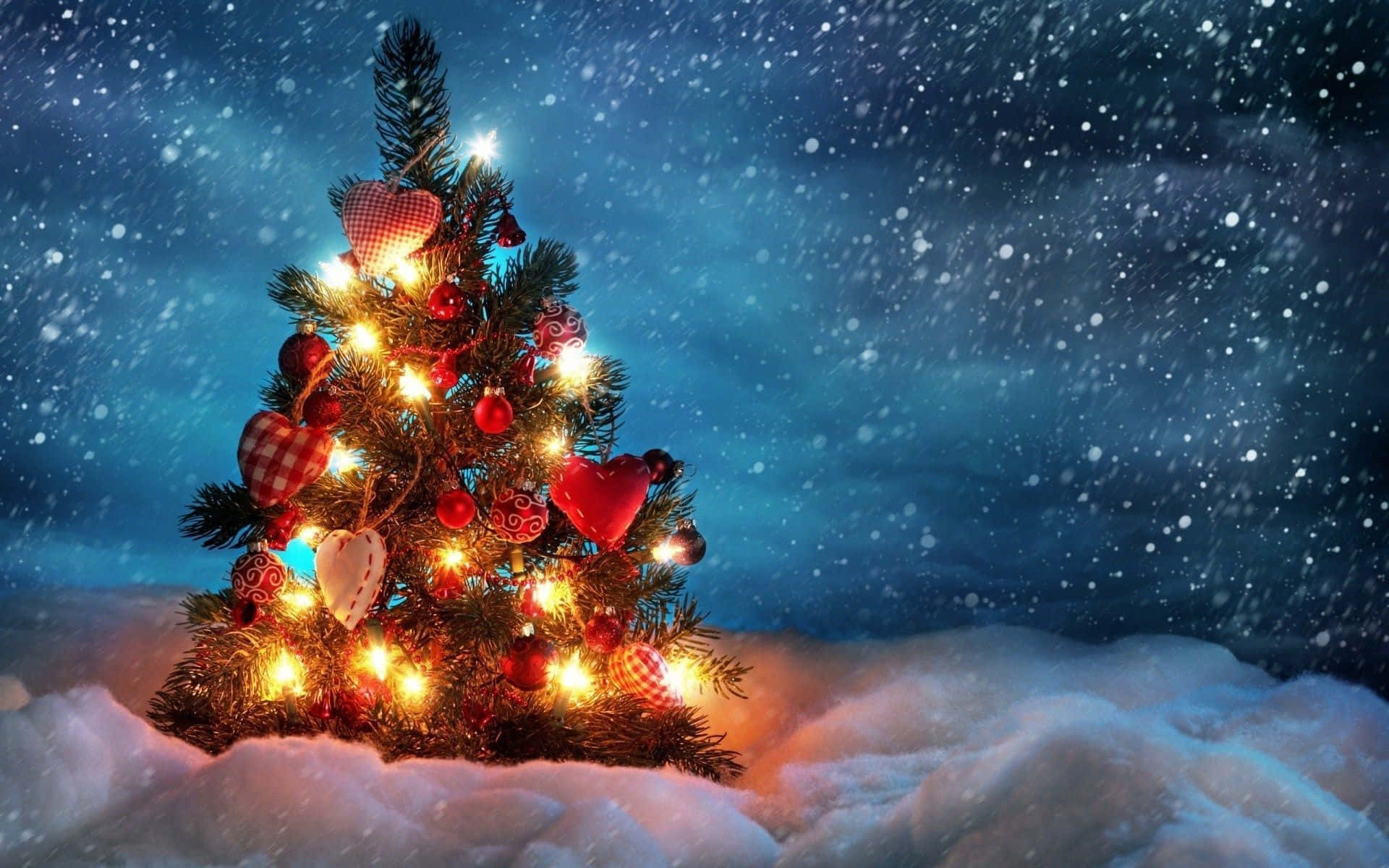 Árbol de Navidad con nieve en noche estrellada gratis Fondos de pantalla