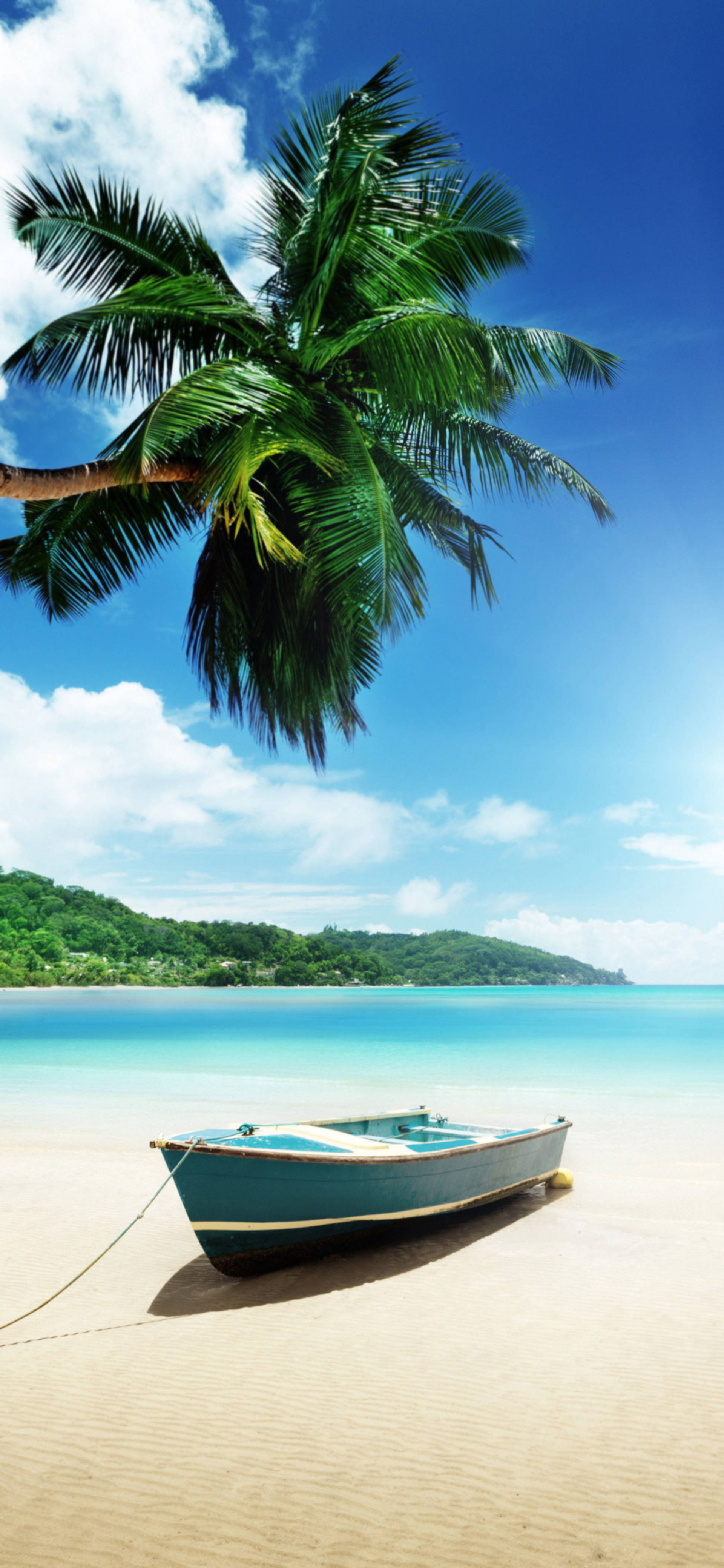 iPhone 13 Pro Max: Disfruta los Impresionantes Visuales con Tema de Playa Tropical Fondos de pantalla