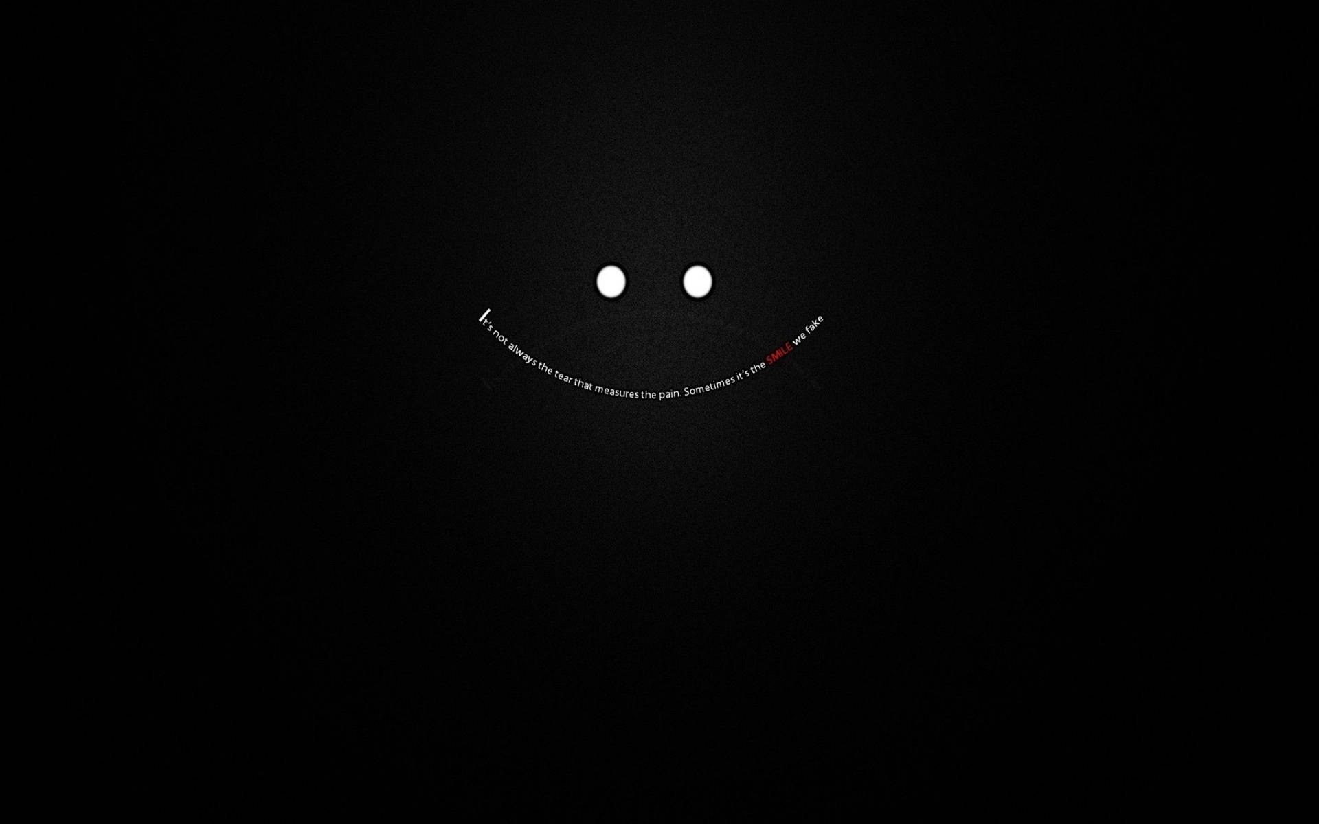 Laptop oscuro con emoticono sonriente y citas — Minimalista Fondos de pantalla