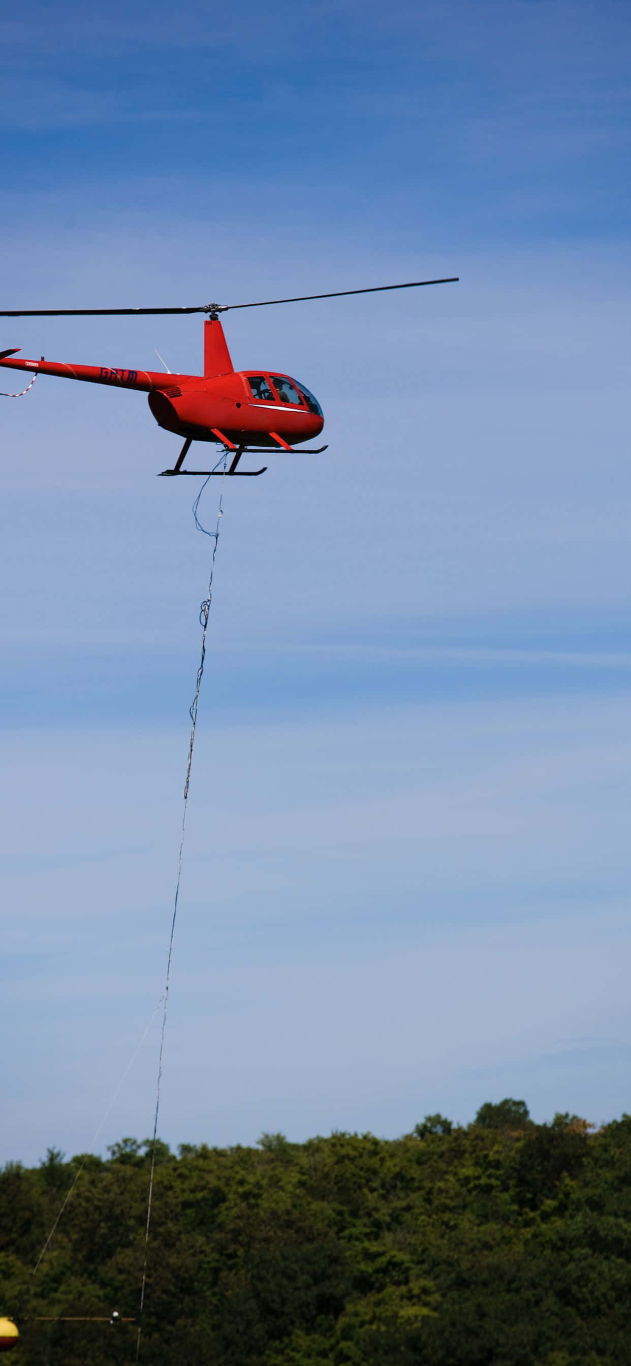 Lleva tu iPhone Xs Max a nuevas alturas con una impresionante vista aérea de un helicóptero Fondos de pantalla