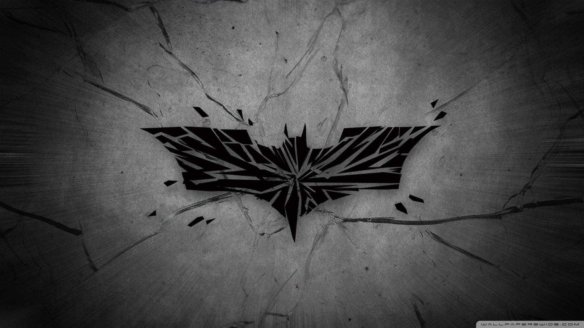 Fondo de pantalla del logotipo agrietado de Batman