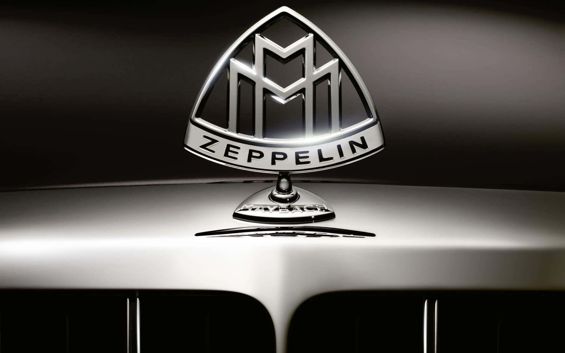 Logotipo Elegante de Coche sobre Fondo Rojo Degradado Fondos de pantalla