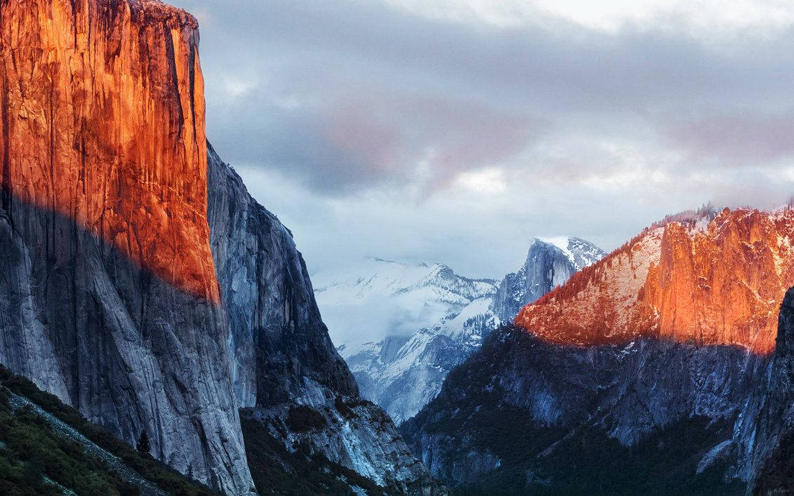 Majestuosa montaña Yosemite desde la vista de una MacBook Pro Fondos de pantalla