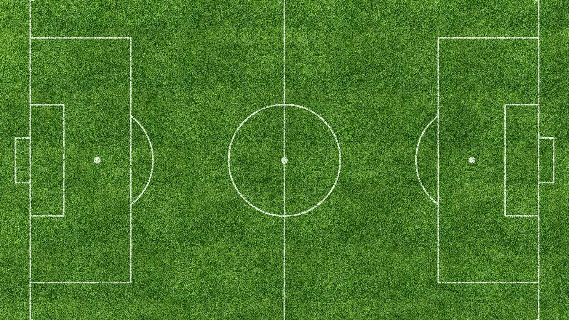 Fondo de pantalla de escritorio de marcas blancas de campo de fútbol.