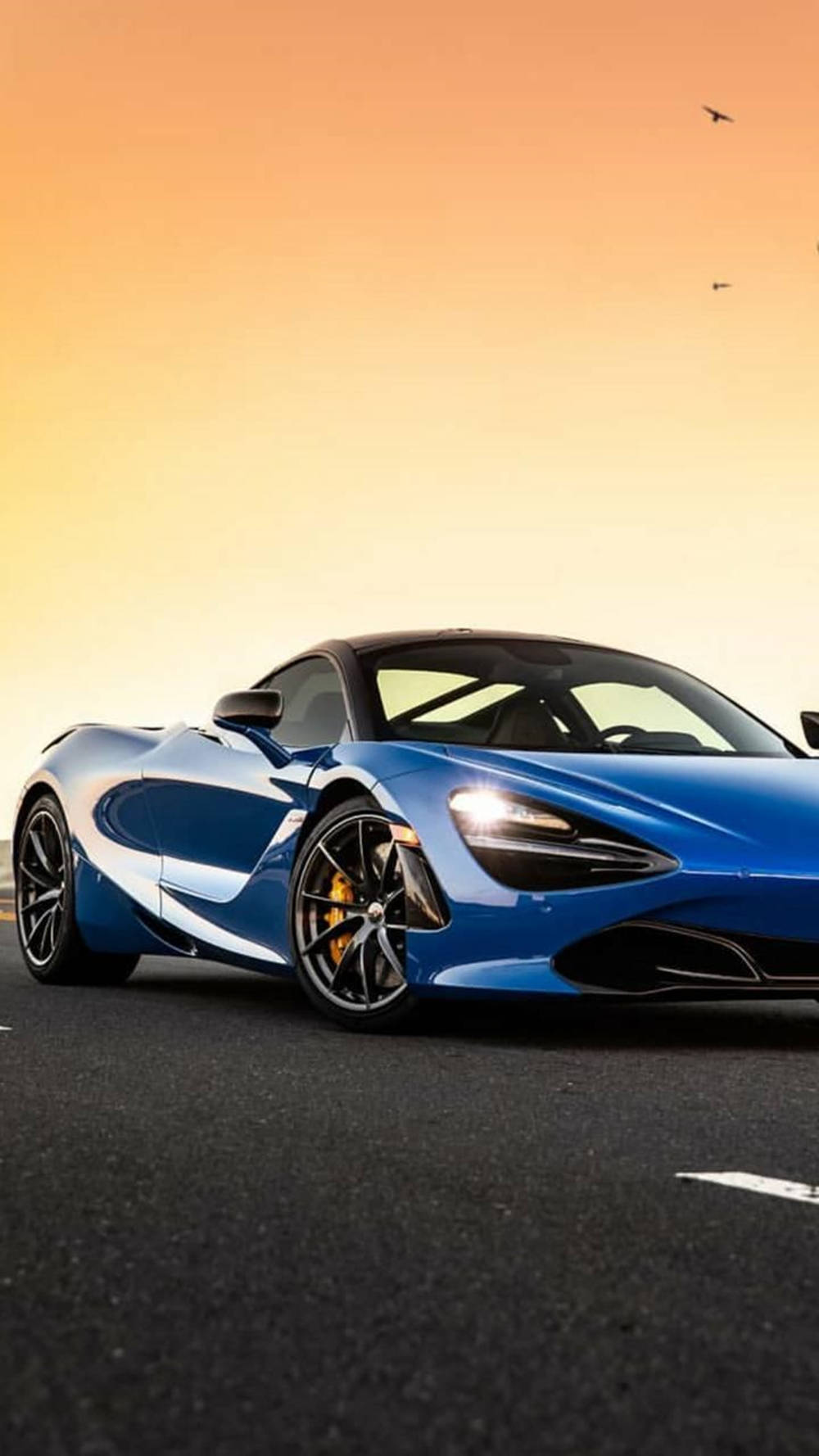 McLaren 720S azul bajo el atardecer para teléfono Fondos de pantalla