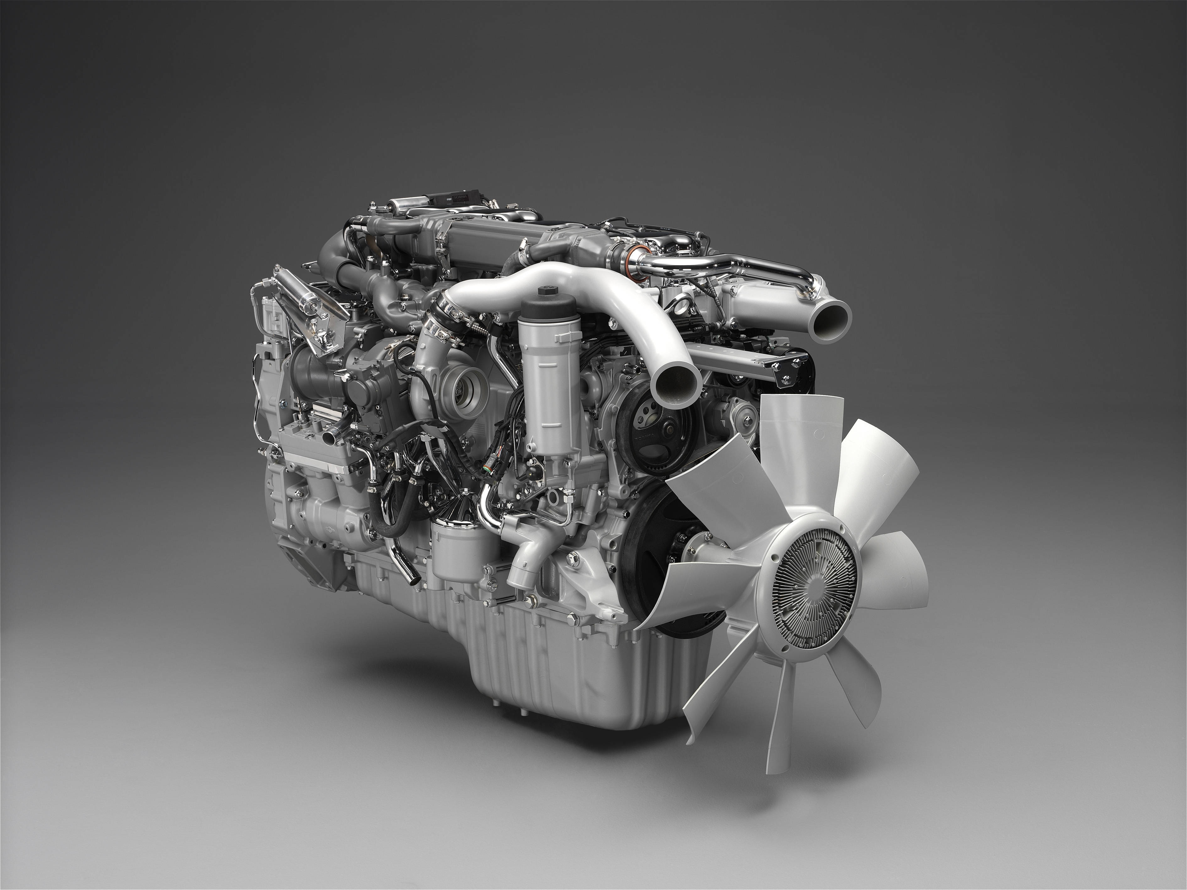 Motor Mecánico 3D en un Diseño Elegante Gris Fondos de pantalla