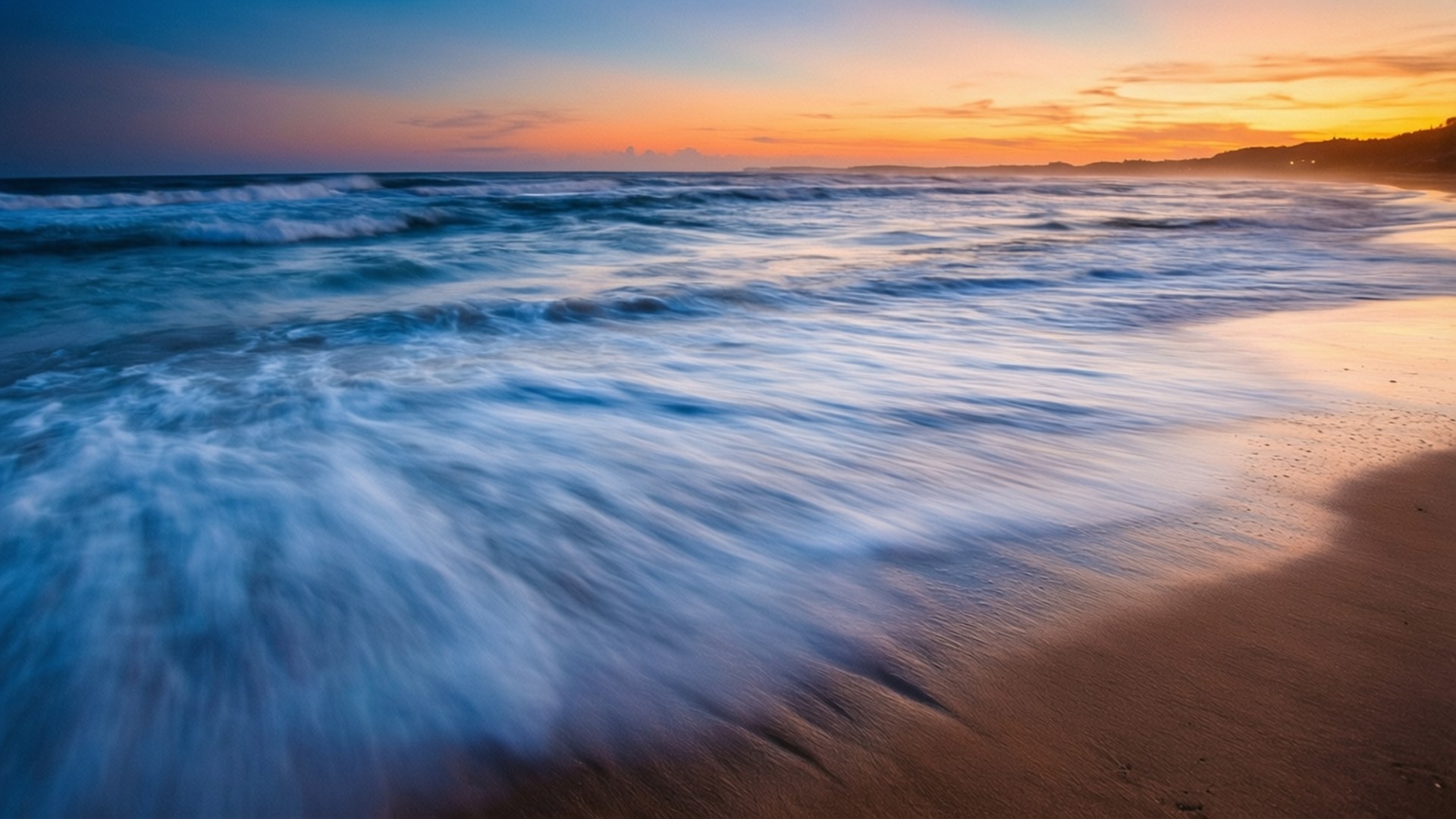 Olas del atardecer con exposición prolongada Fondos de pantalla