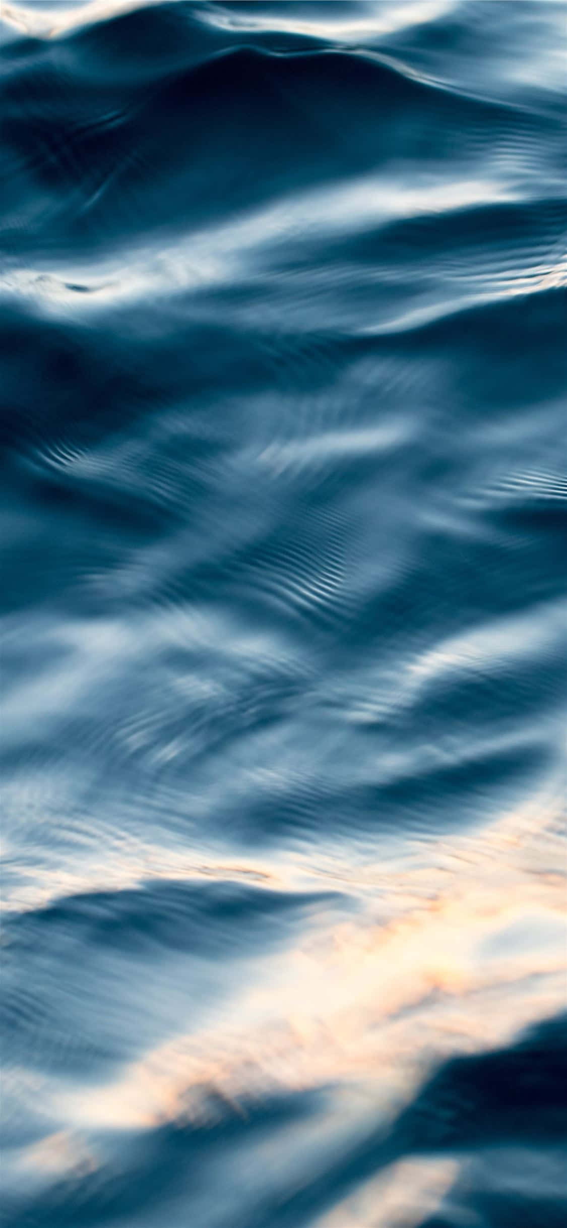 primer plano de la superficie del agua al atardecer Fondos de pantalla