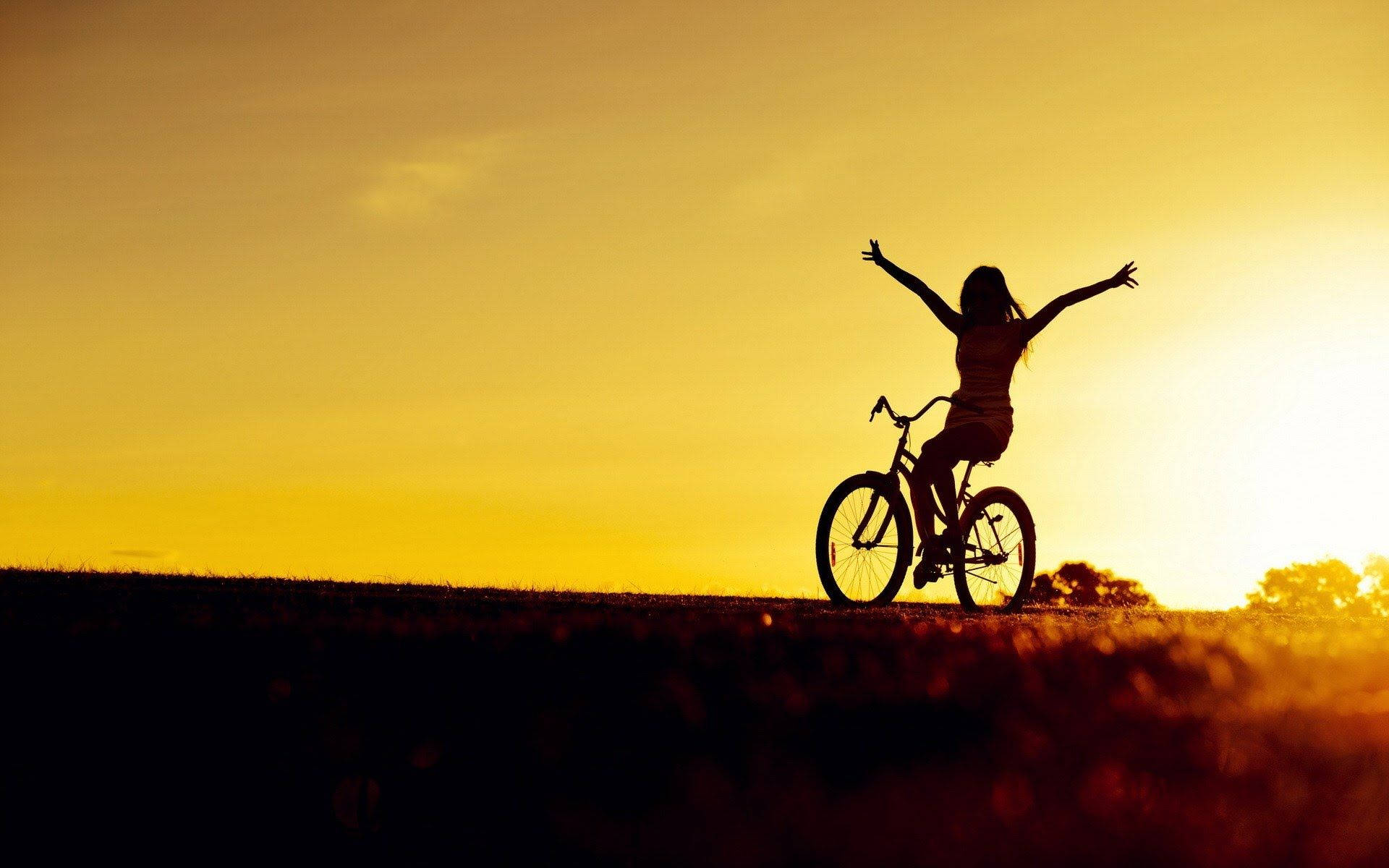 Silueta de un amante de la bicicleta al atardecer Fondos de pantalla