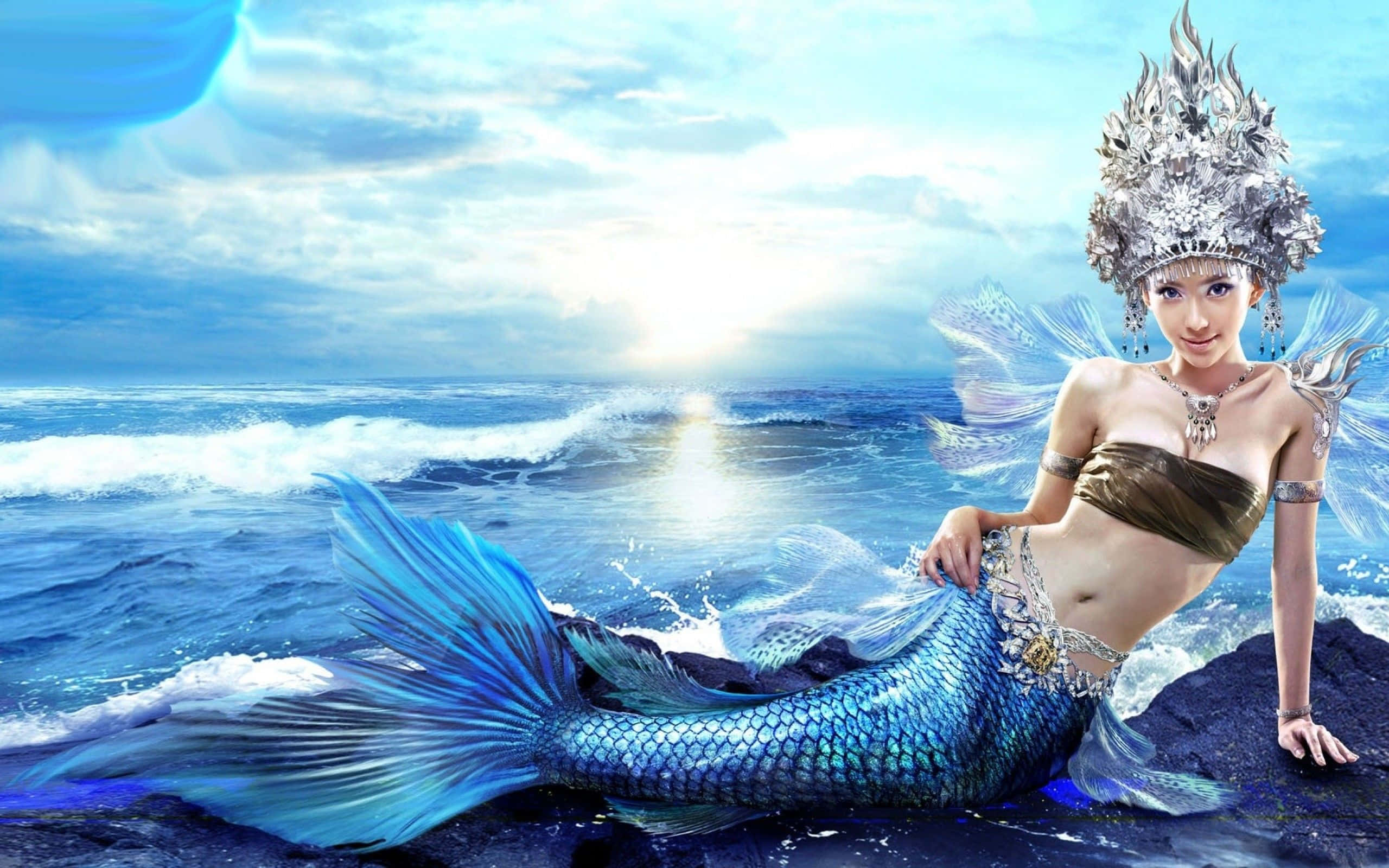 Sirena con cola azul brillante y tocado plateado Fondos de pantalla