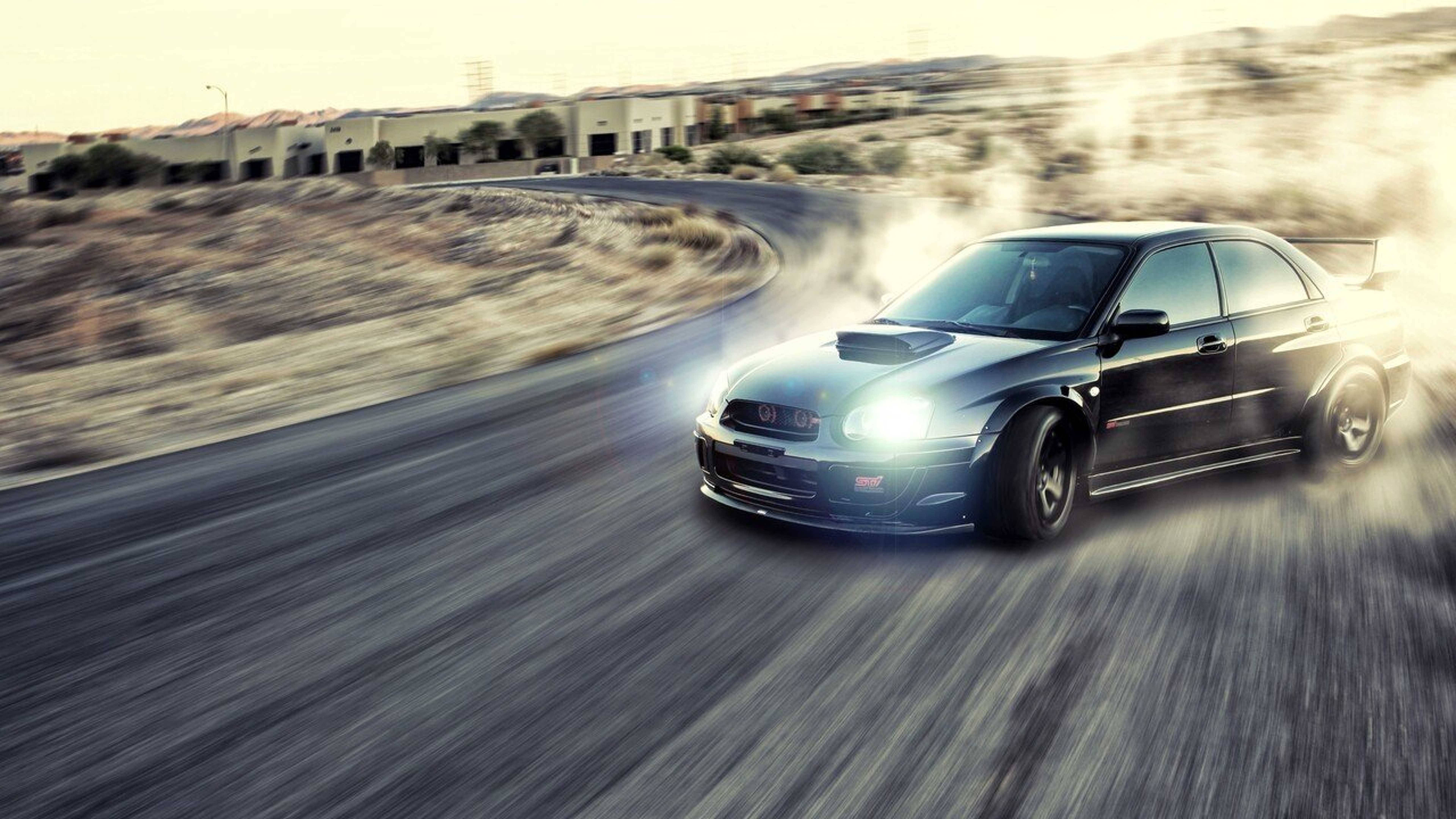 Subaru Impreza WRX rugiendo en acción de derrape Fondos de pantalla