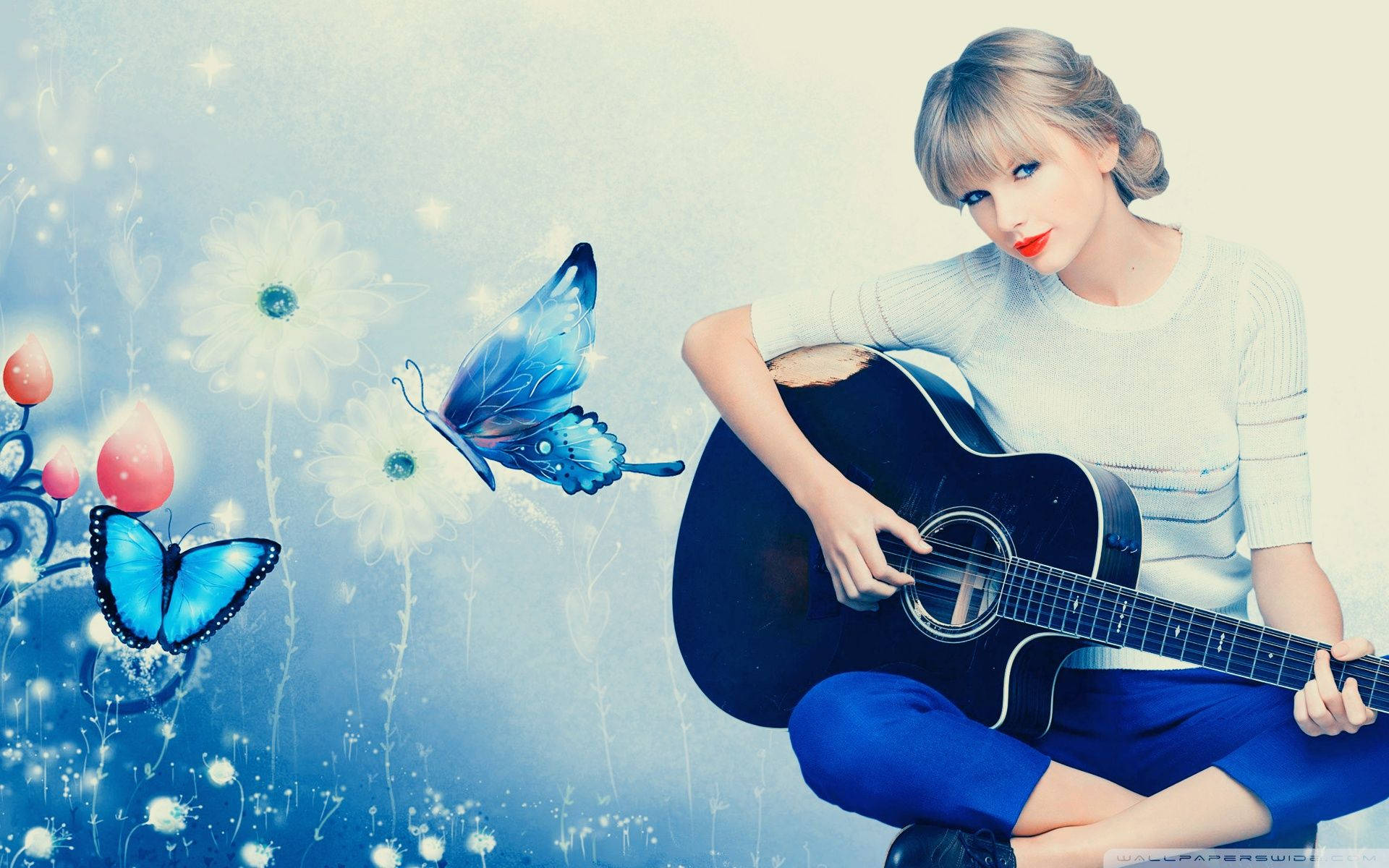 Fondo de pantalla de Taylor Swift tocando la guitarra con temática azul.
