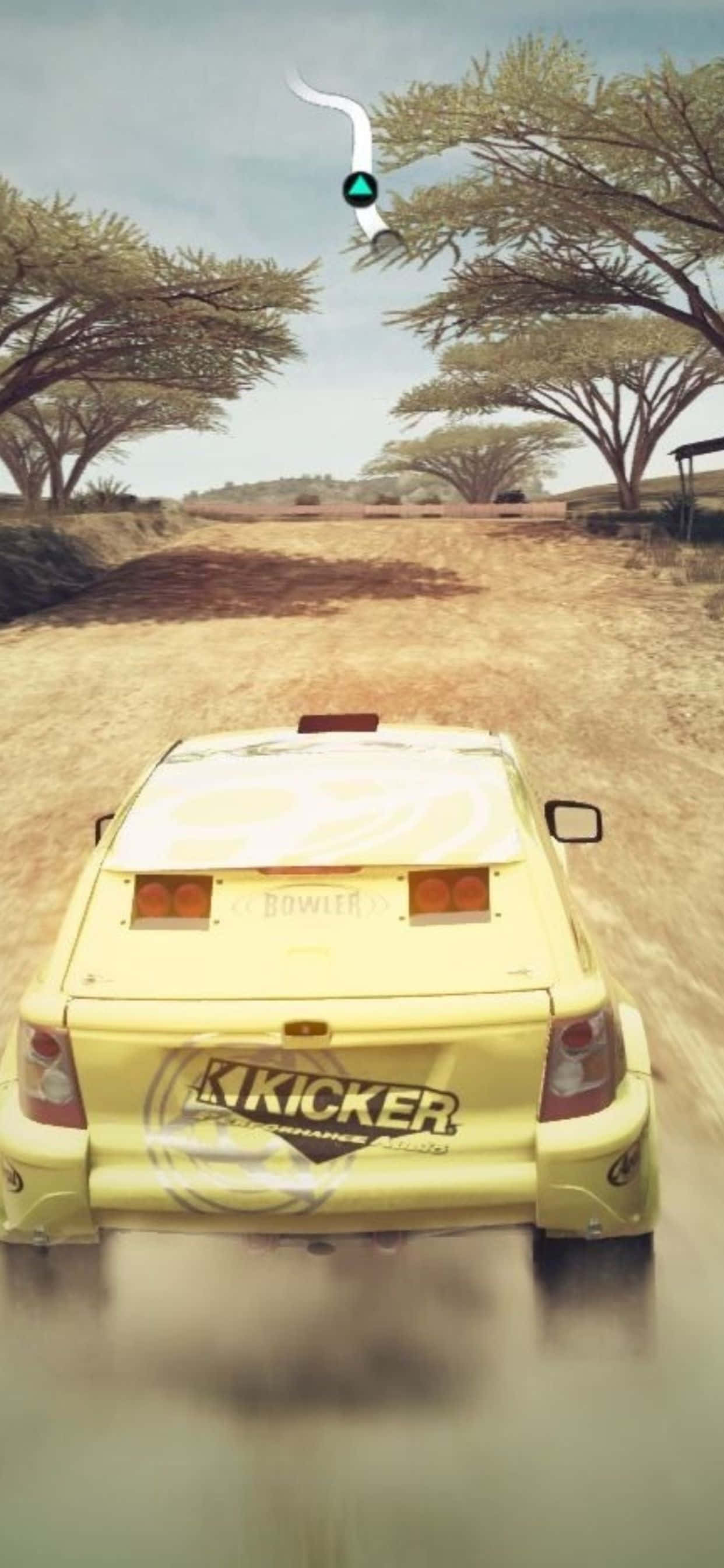 un auto amarillo conduciendo por el desierto Fondos de pantalla