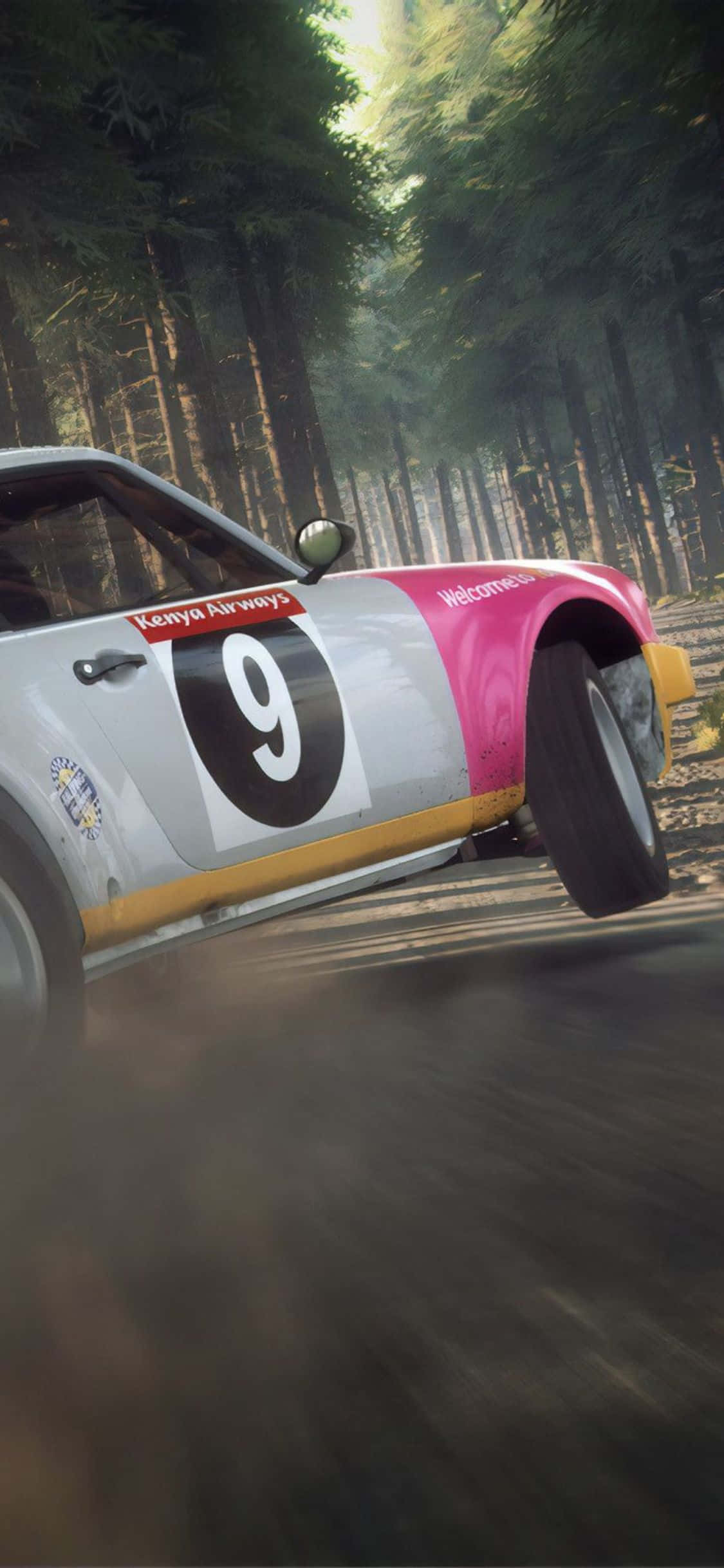 un auto de rally conduciendo por el bosque Fondos de pantalla