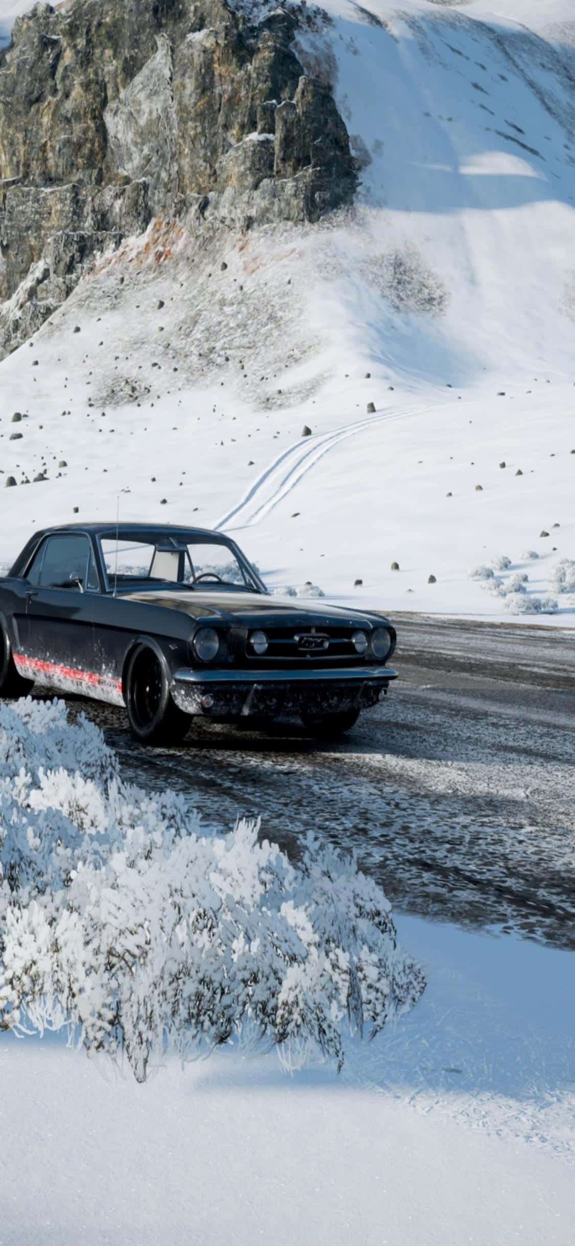 un auto negro conduciendo por un camino nevado Fondos de pantalla