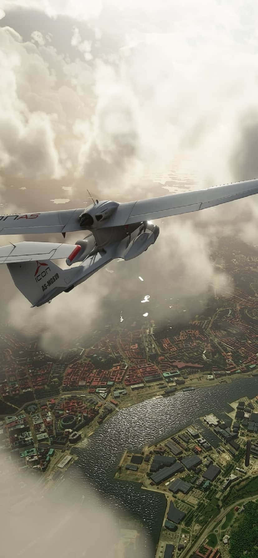 Un avión pequeño volando sobre una ciudad Fondos de pantalla