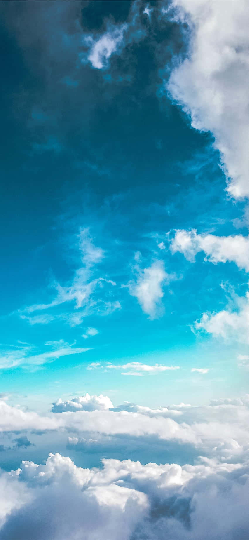 un avión volando sobre las nubes Fondos de pantalla