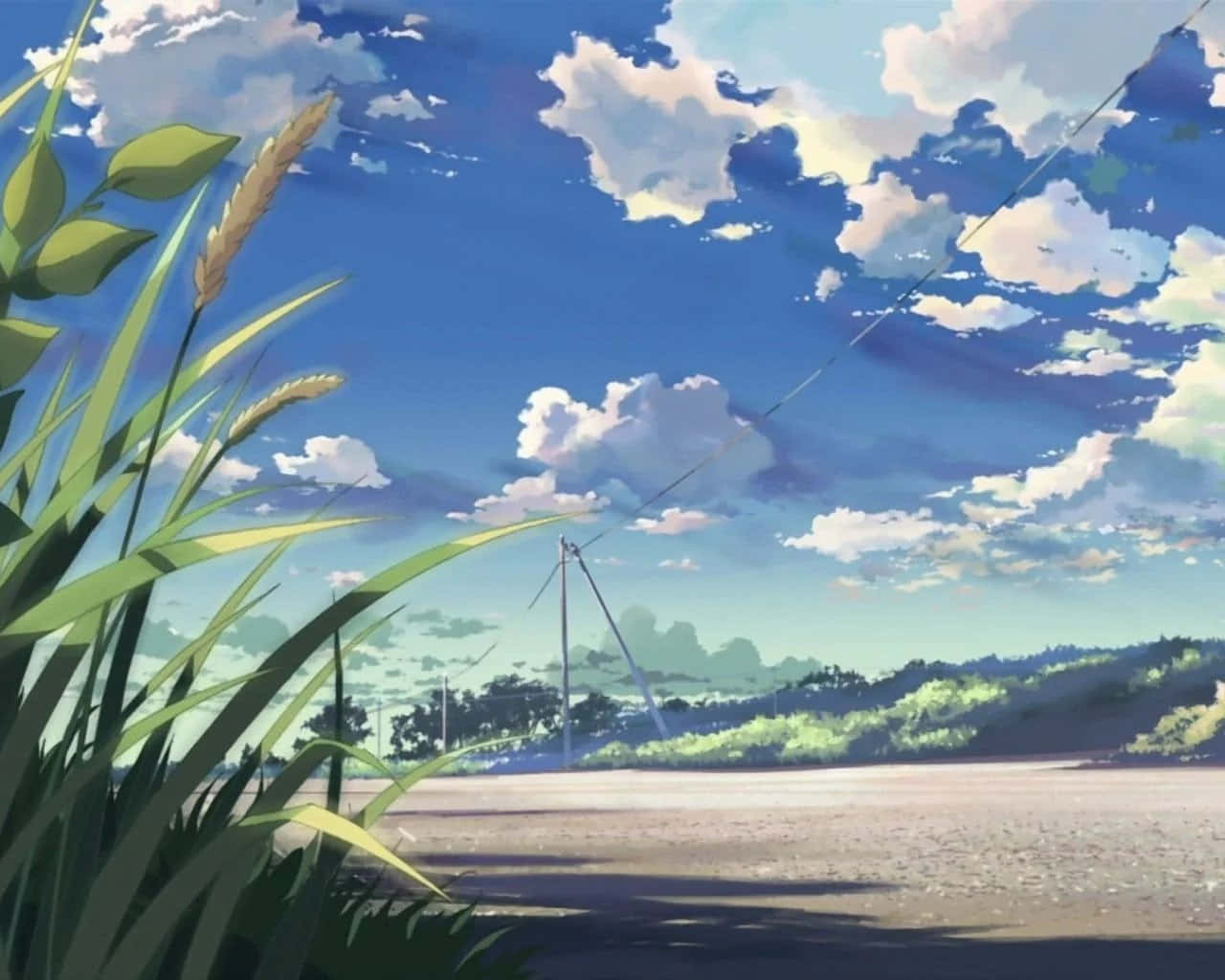 un camino con pasto y nubes al fondo Fondos de pantalla