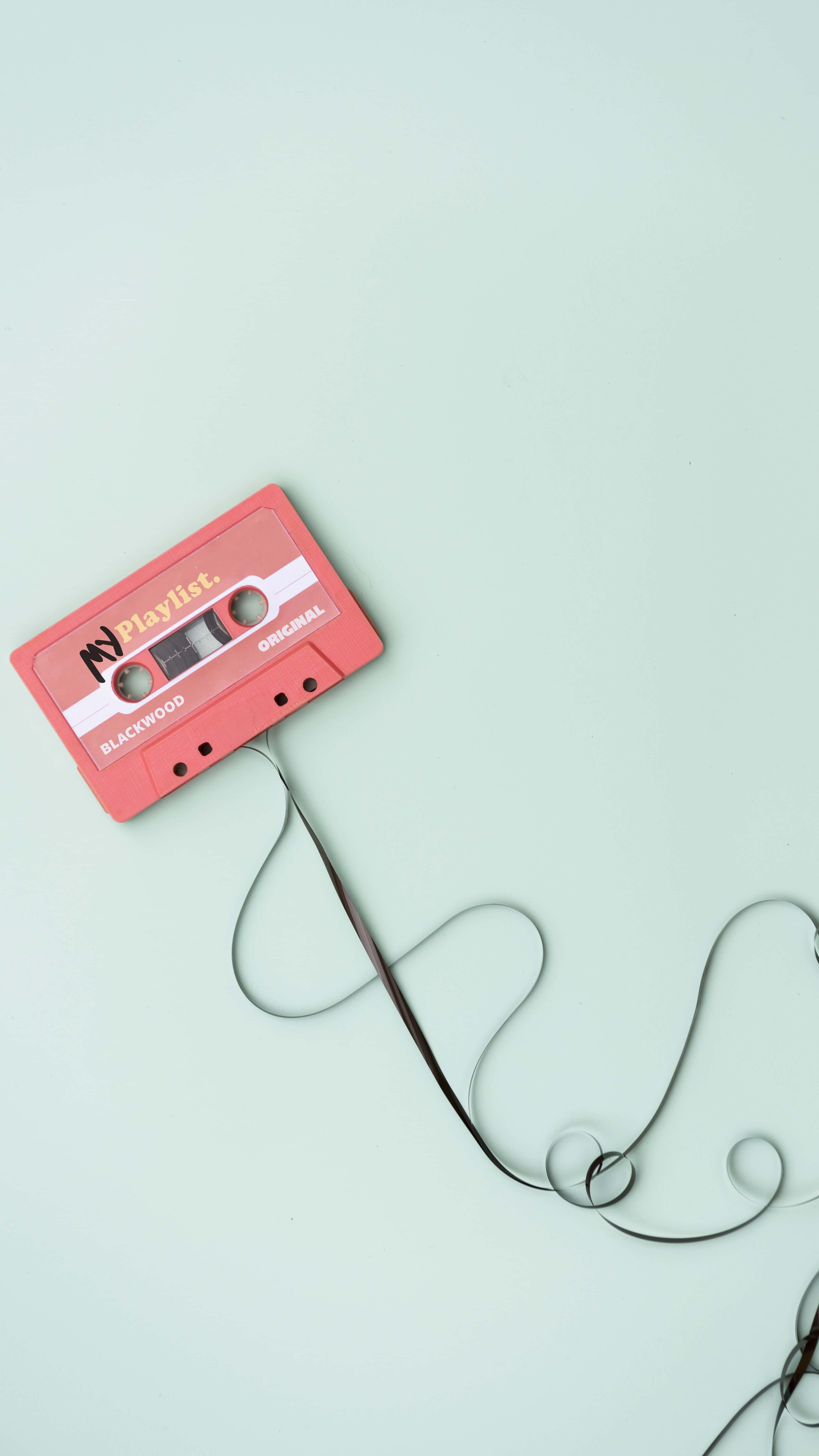 un cassette está conectado a un cable Fondos de pantalla