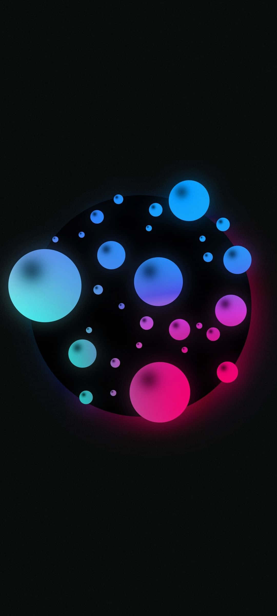 un círculo de burbujas de colores sobre un fondo negro Fondos de pantalla