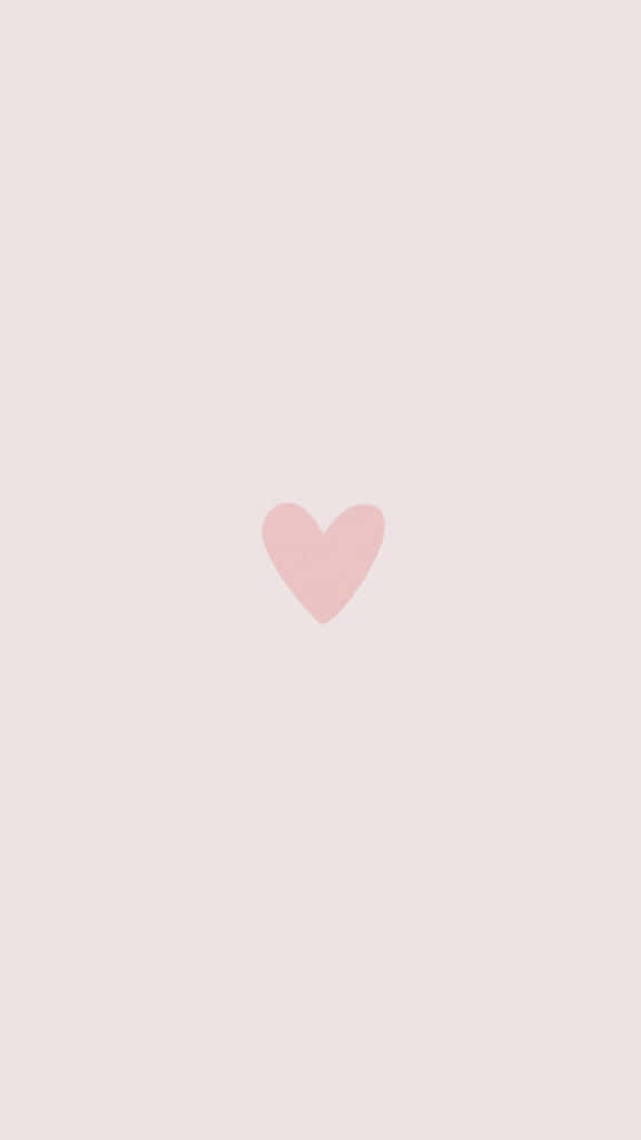 un corazón rosa sobre fondo blanco Fondos de pantalla