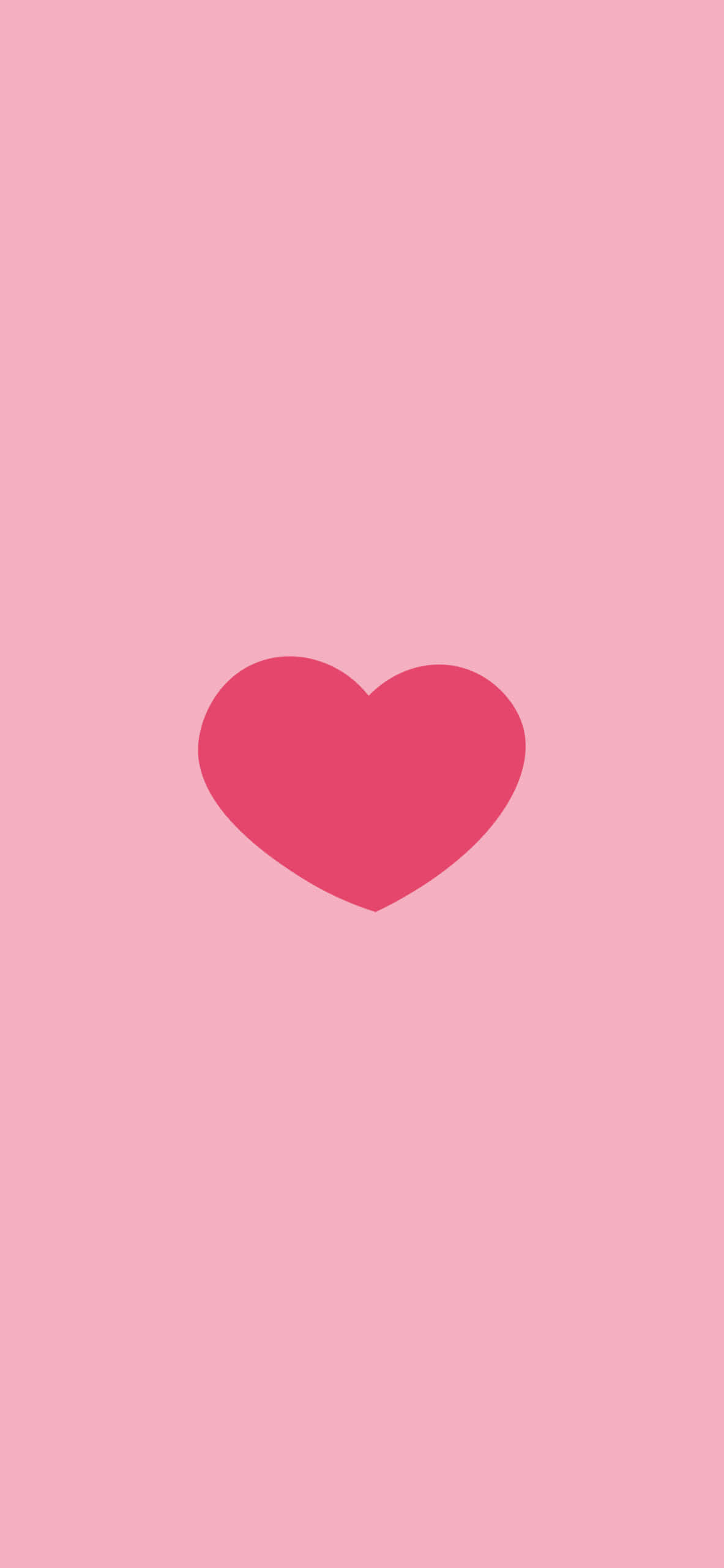 un corazón rosa sobre un fondo rosa Fondos de pantalla