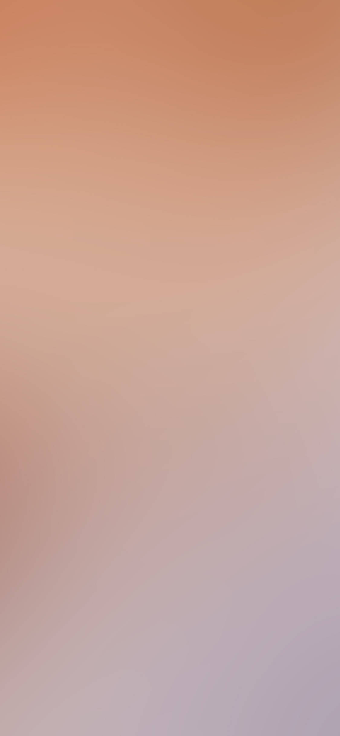Un elegante iPhone color beige en la mano Fondos de pantalla