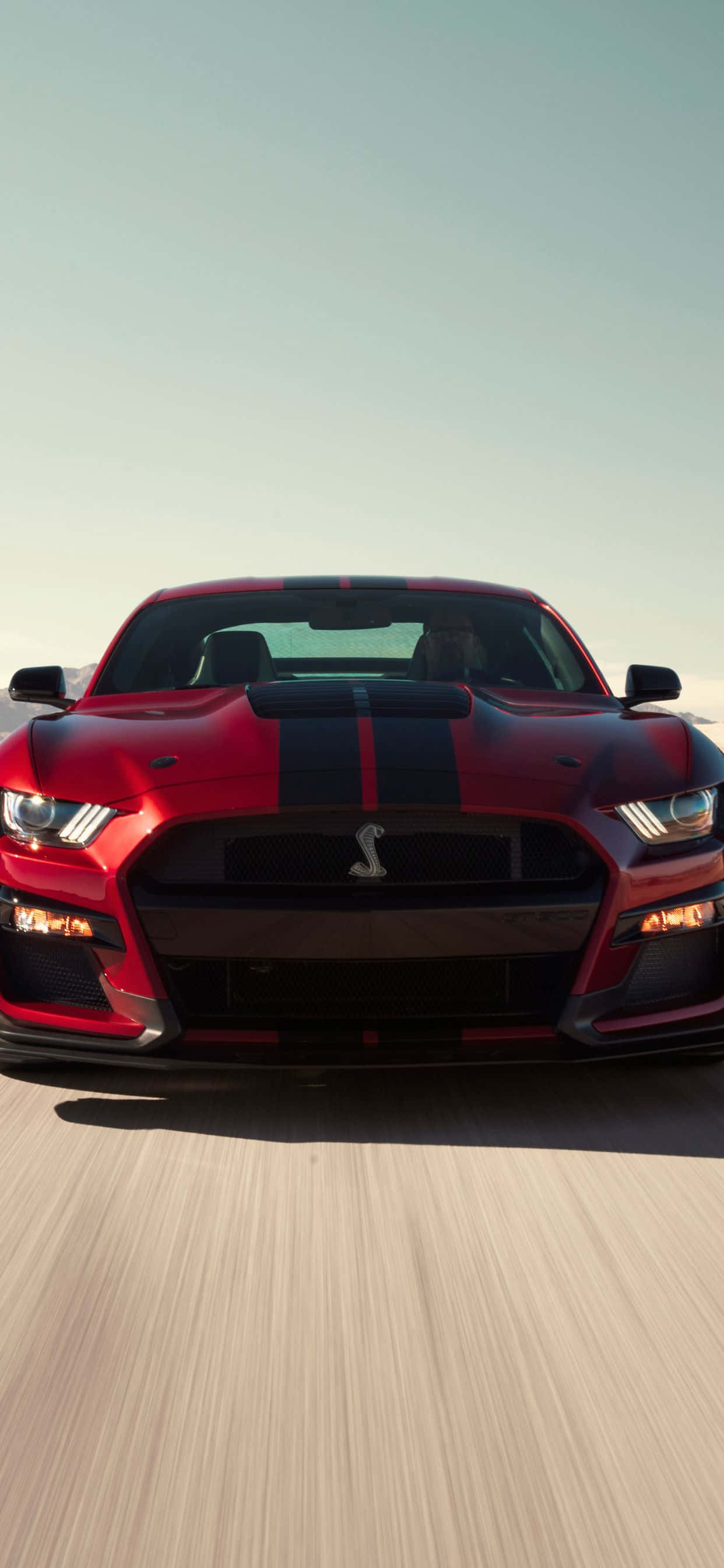 Un elegante Mustang iPhone, perfecto para cualquier fanático Fondos de pantalla