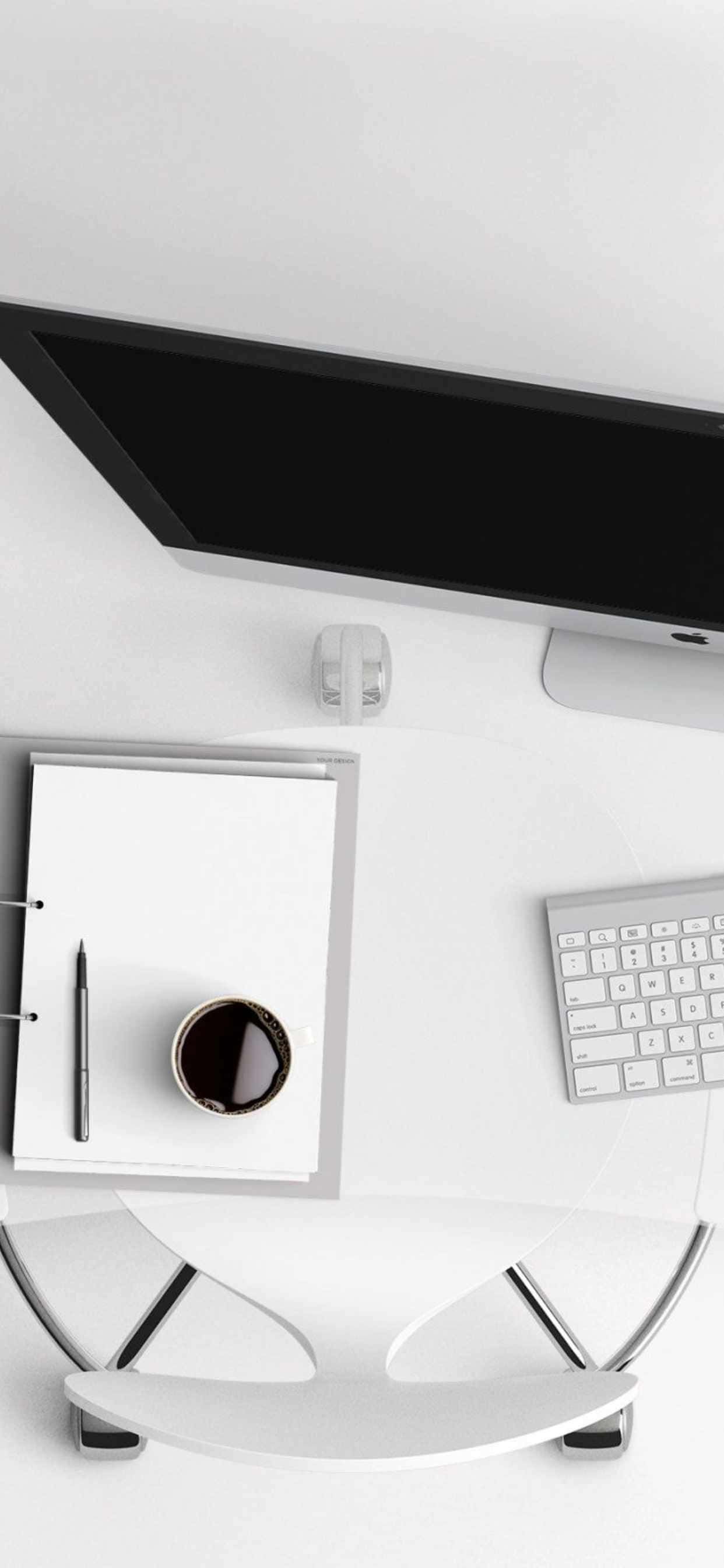 un escritorio blanco con un monitor, teclado y una taza de café Fondos de pantalla