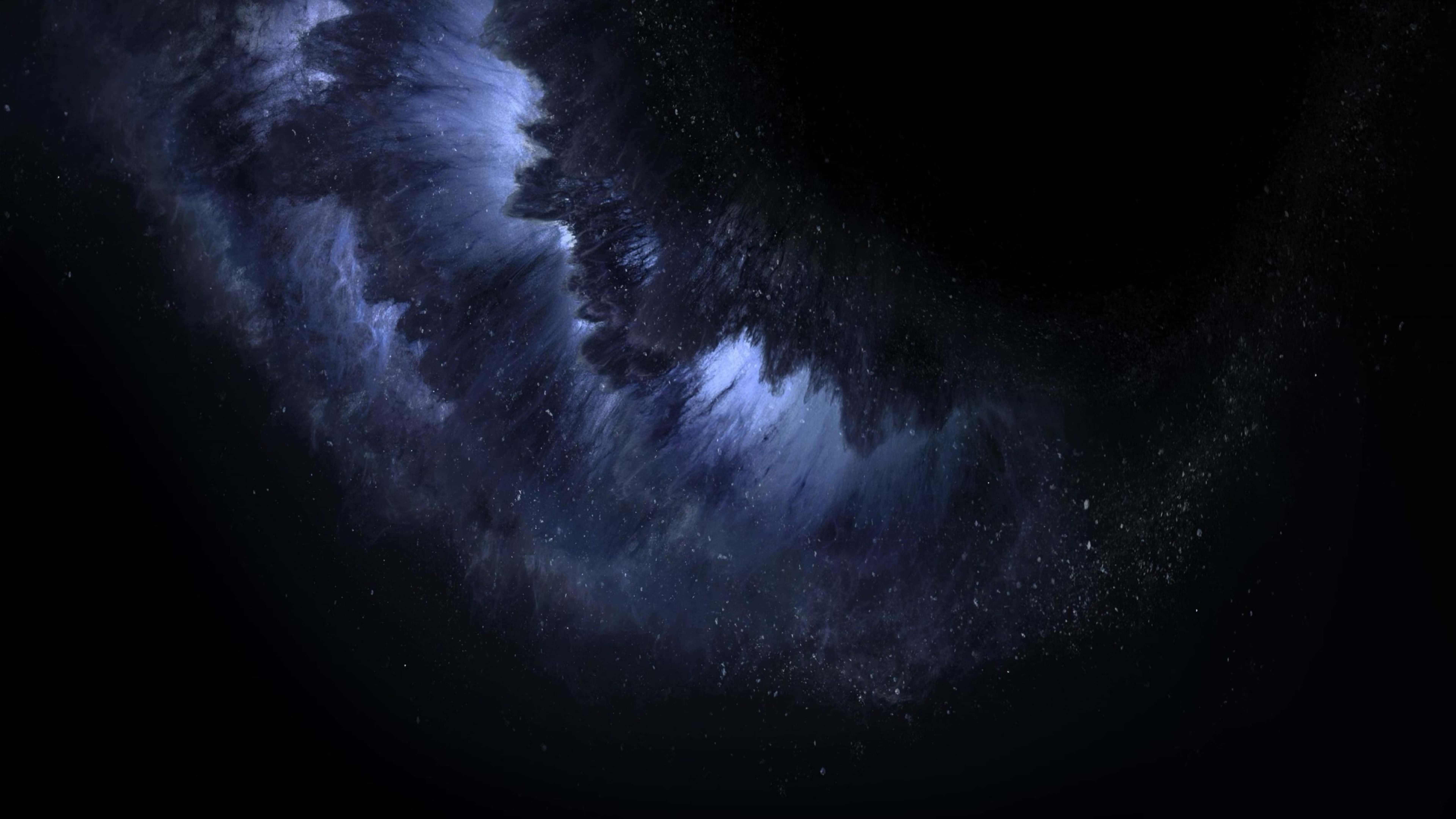 un espacio negro con un remolino azul y negro Fondos de pantalla