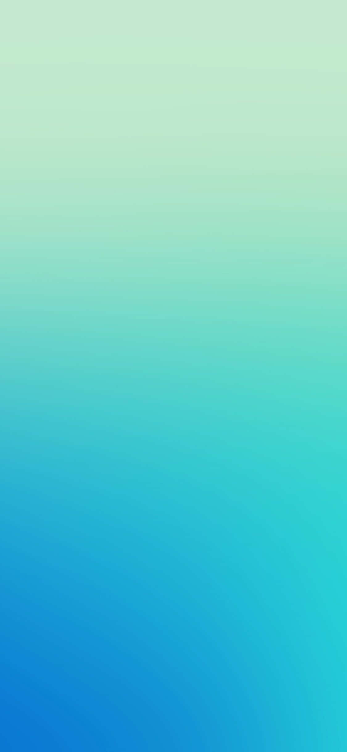 Un fondo degradado azul y verde Fondos de pantalla
