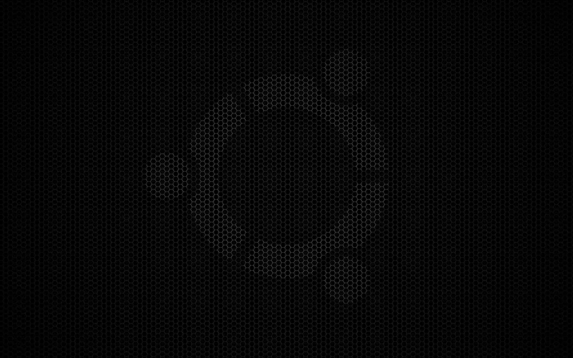 un fondo negro con un círculo encima Fondos de pantalla