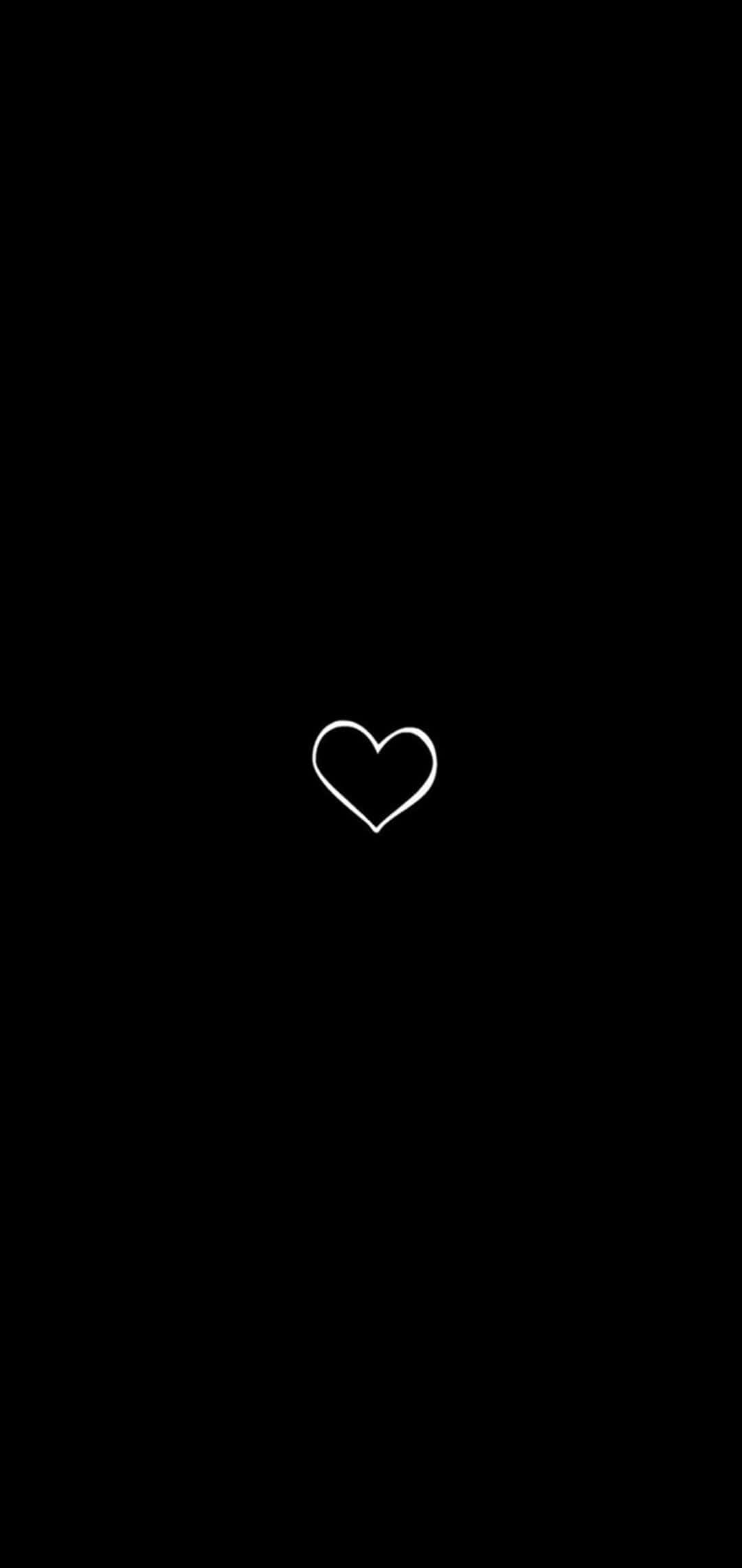 Un fondo negro con un corazón blanco Fondos de pantalla