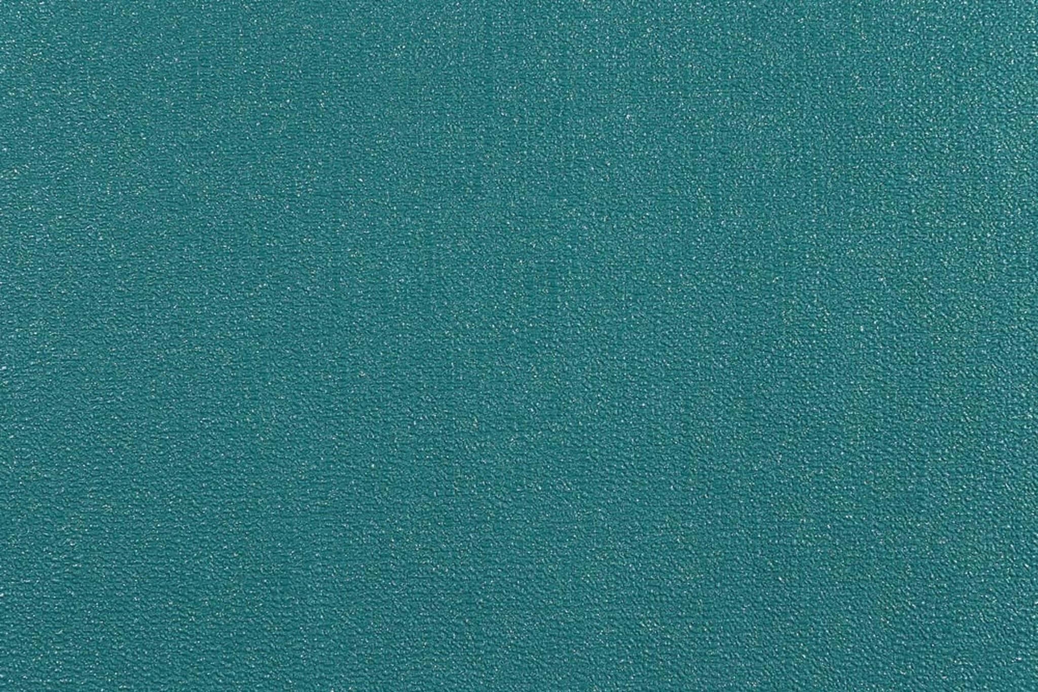 Un fondo verde esmeralda profundo, perfecto para proyectos elegantes Fondos de pantalla