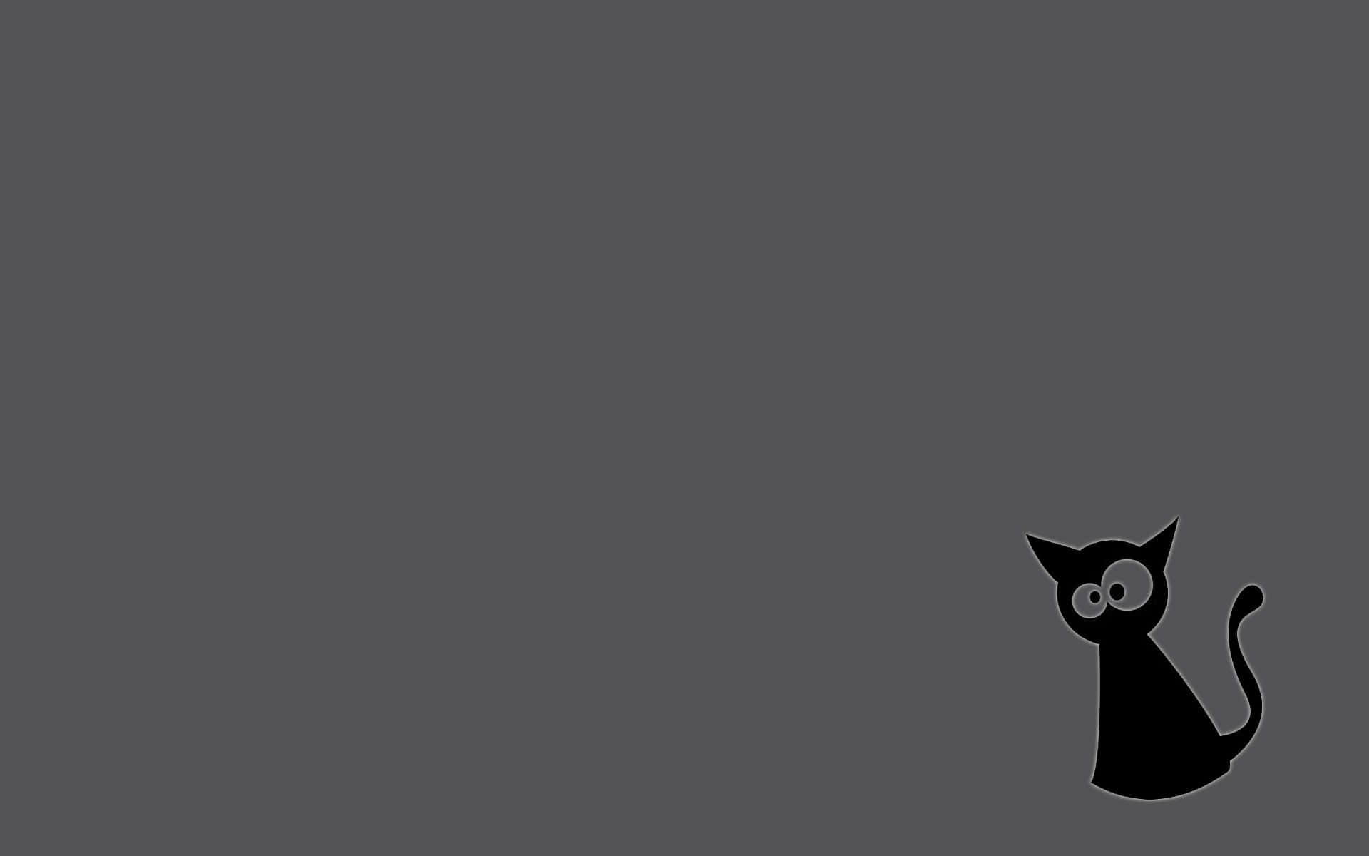 Un gato negro está sentado sobre un fondo gris Fondos de pantalla