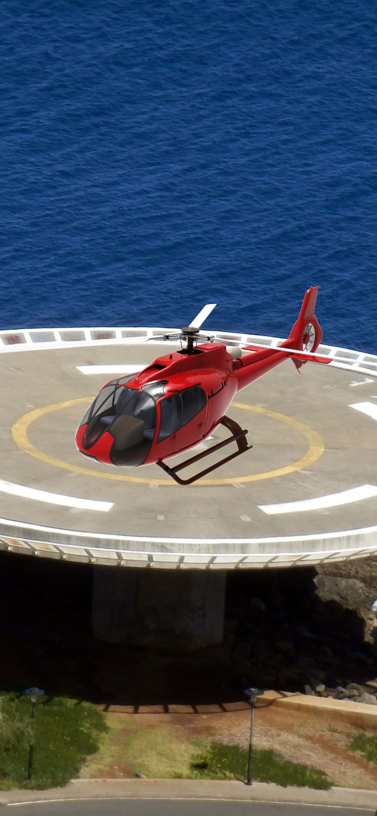 un helicóptero volando sobre el océano Fondos de pantalla