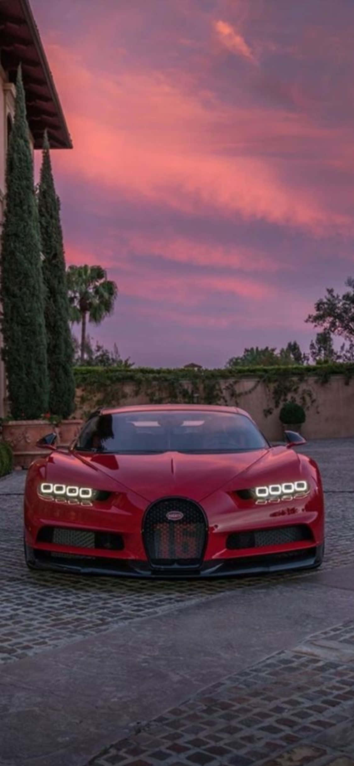 Un iPhone Xs con un lujoso fondo de Bugatti Fondos de pantalla