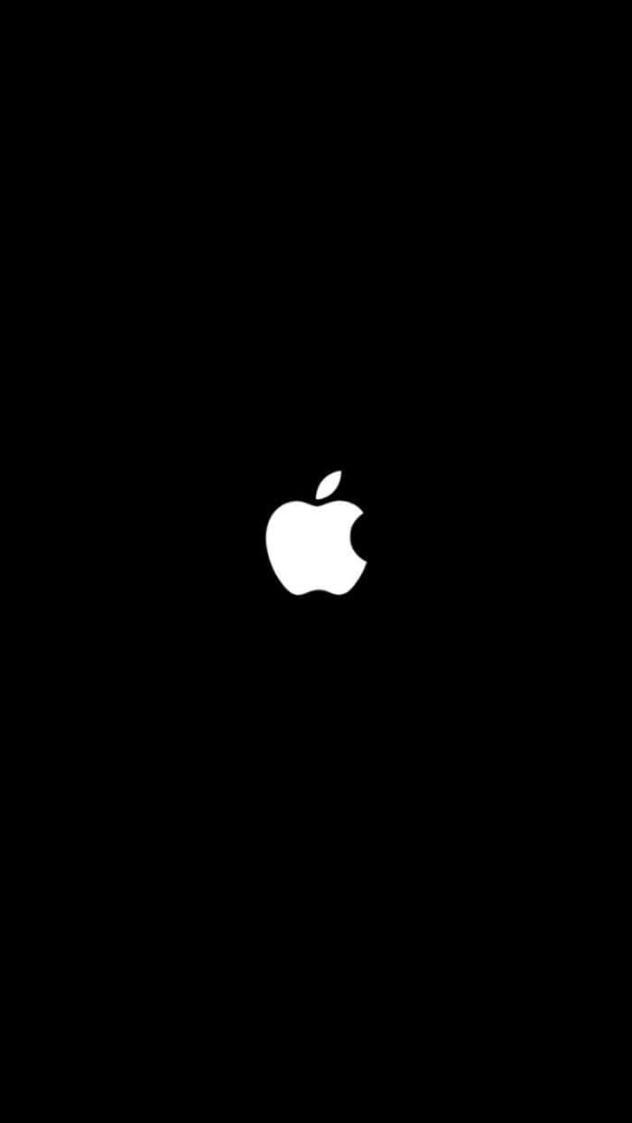 un logotipo de manzana se muestra en un fondo negro Fondos de pantalla