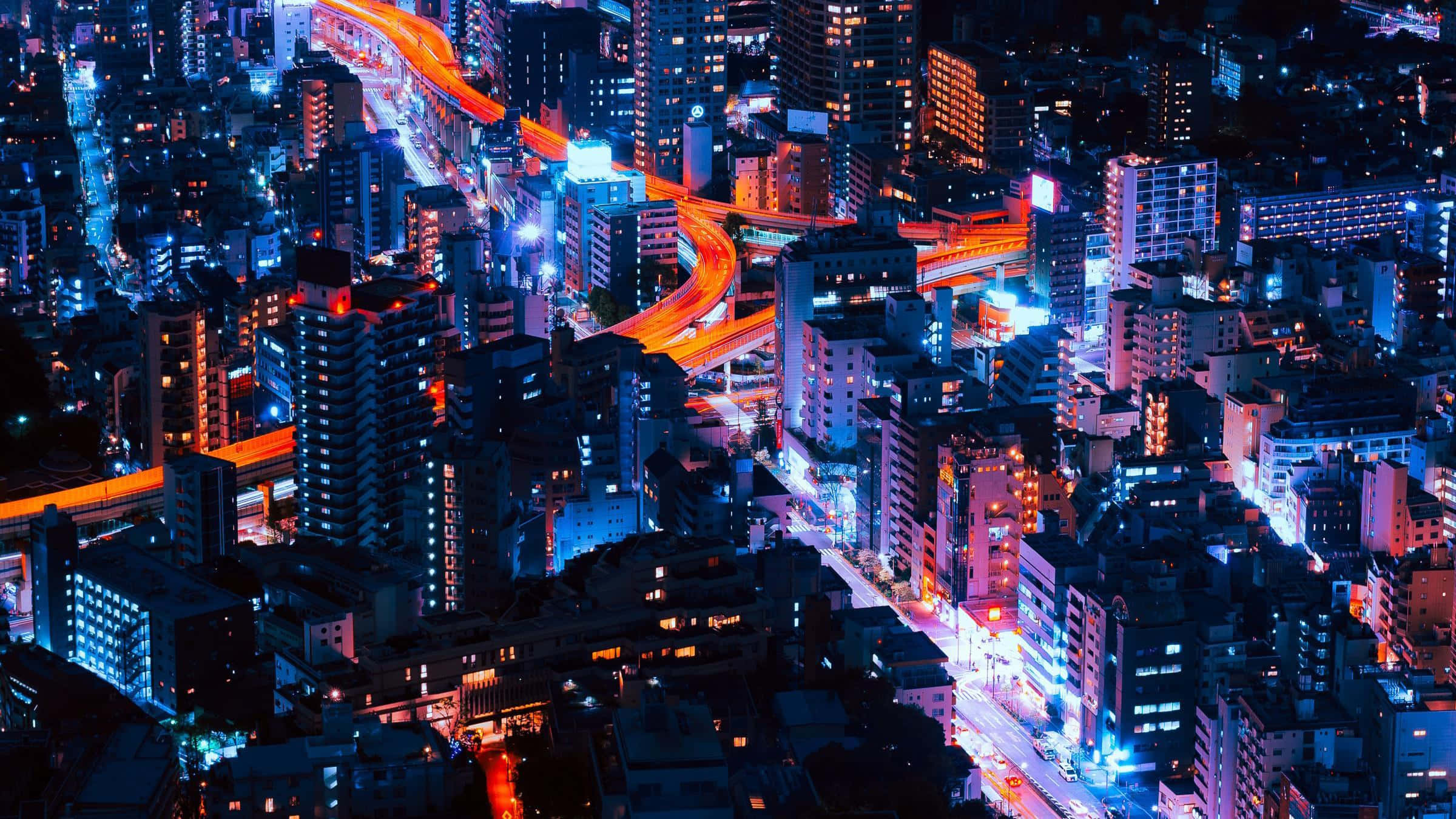Un paisaje urbano neón vibrante y lleno de energía. Fondos de pantalla