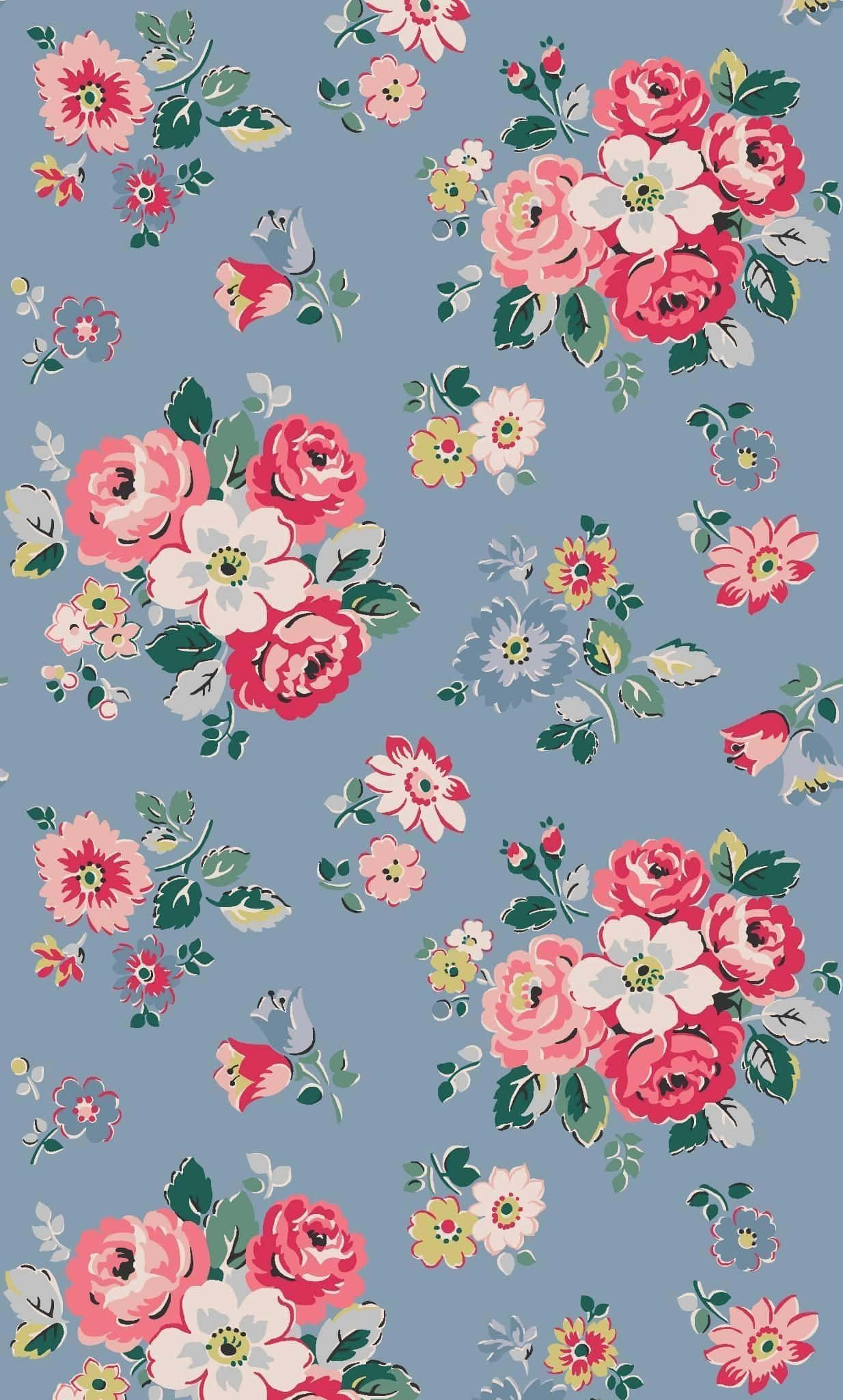 un patrón floral sobre un fondo azul Fondos de pantalla